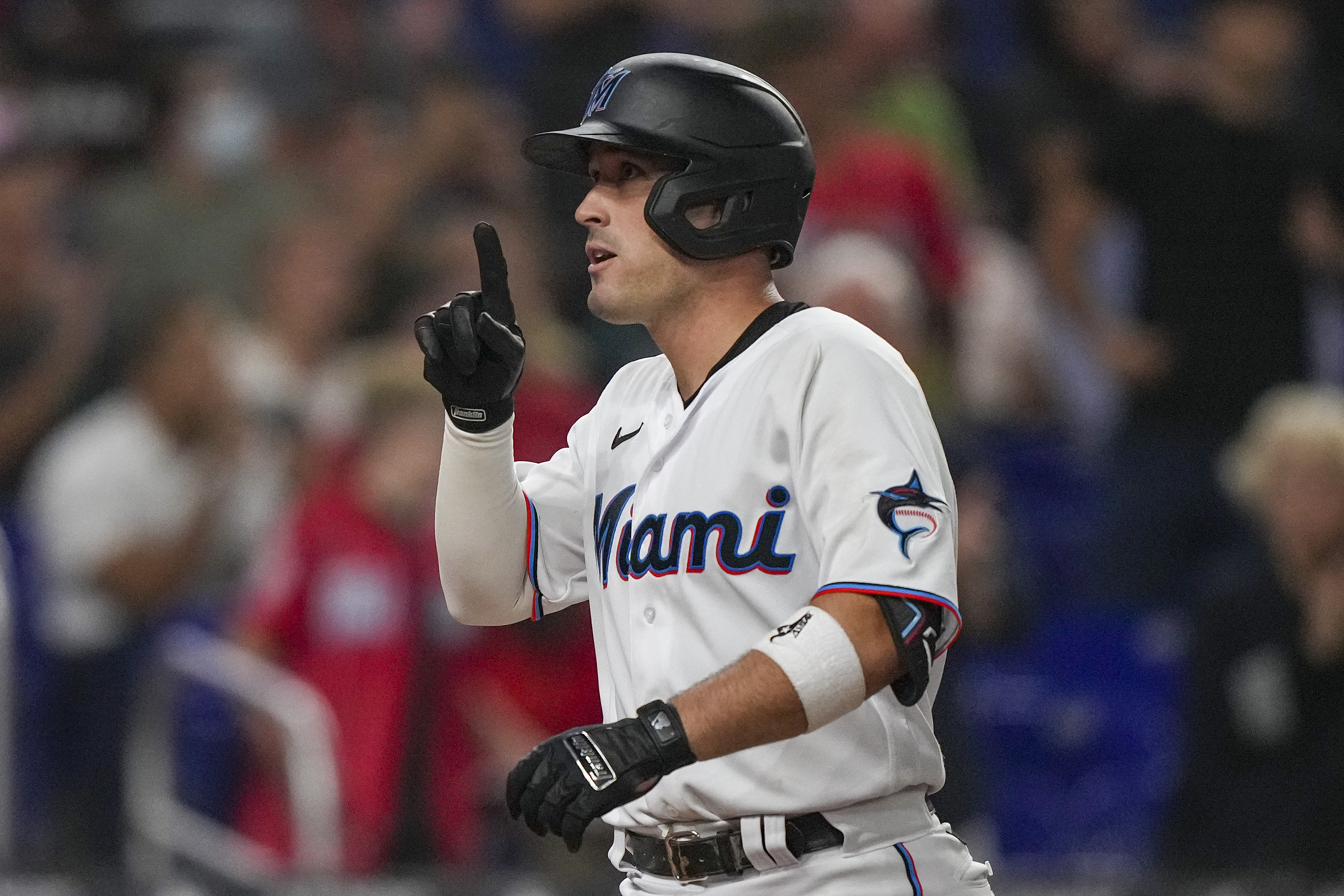 Nick Fortes #54 of the Miami Marlins celebrates as he heads towards home plate after hitting his second home run of the game in the fourth inning against the San Diego Padres at loanDepot park on August 16, 2022 in Miami, Florida.