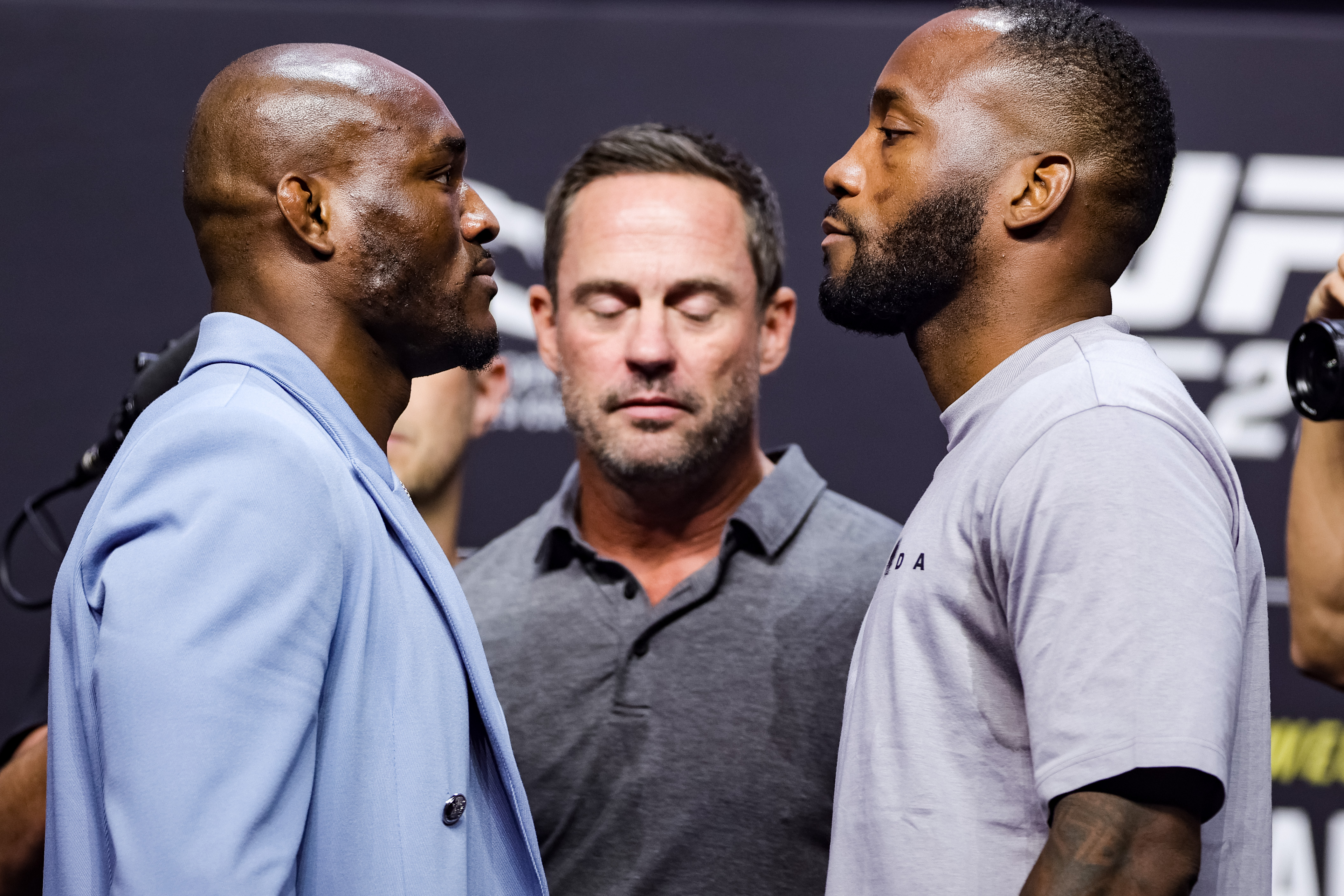 UFC welterweight champion Kamaru Usman and Leon Edwards face off on stage during the UFC 276 ceremonial weigh-in at T-Mobile Arena on July 01, 2022 in Las Vegas, Nevada.