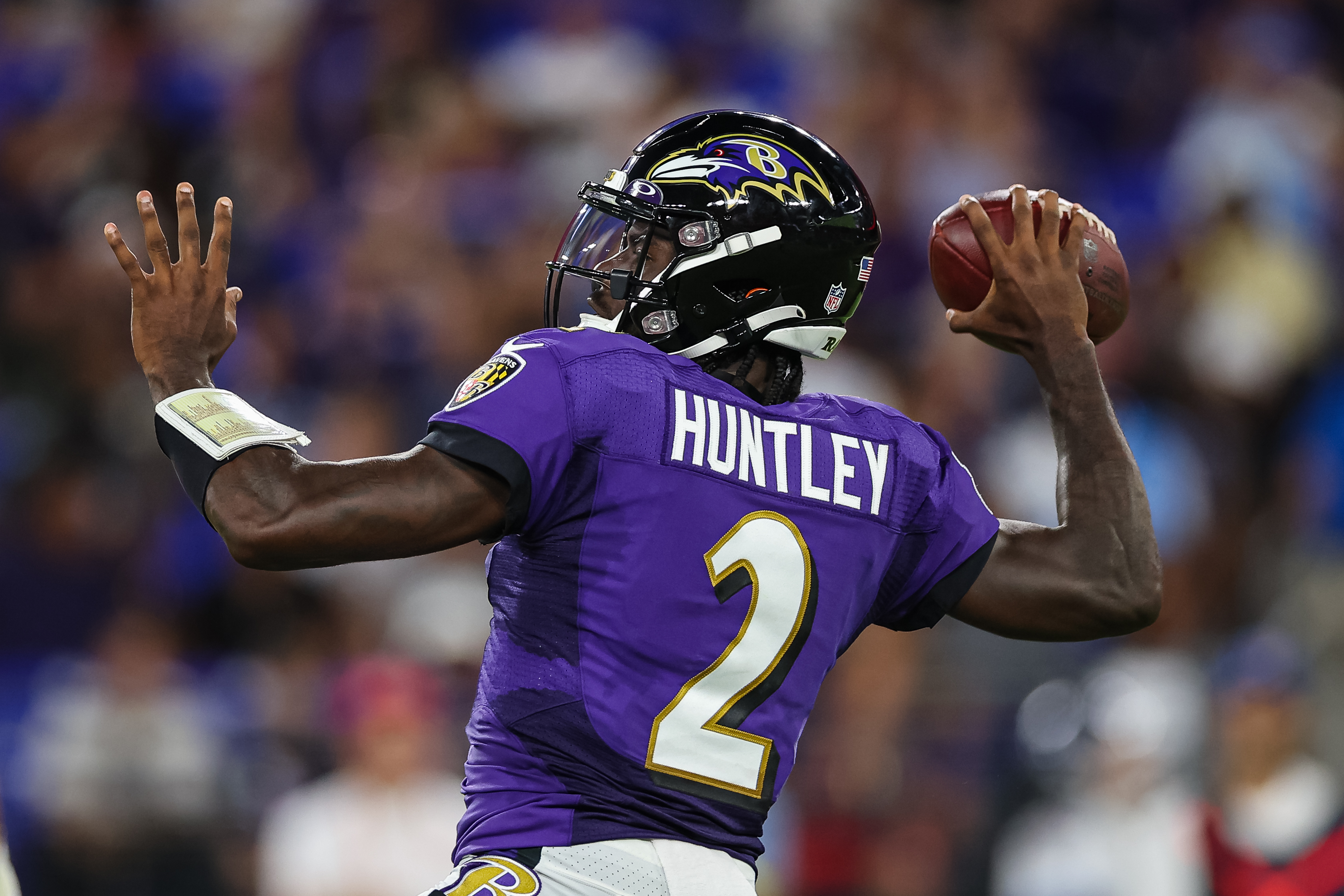 Tyler Huntley #2 of the Baltimore Ravens attempts a pass against the Tennessee Titans during the first half at M&amp;T Bank Stadium on August 11, 2022 in Baltimore, Maryland.