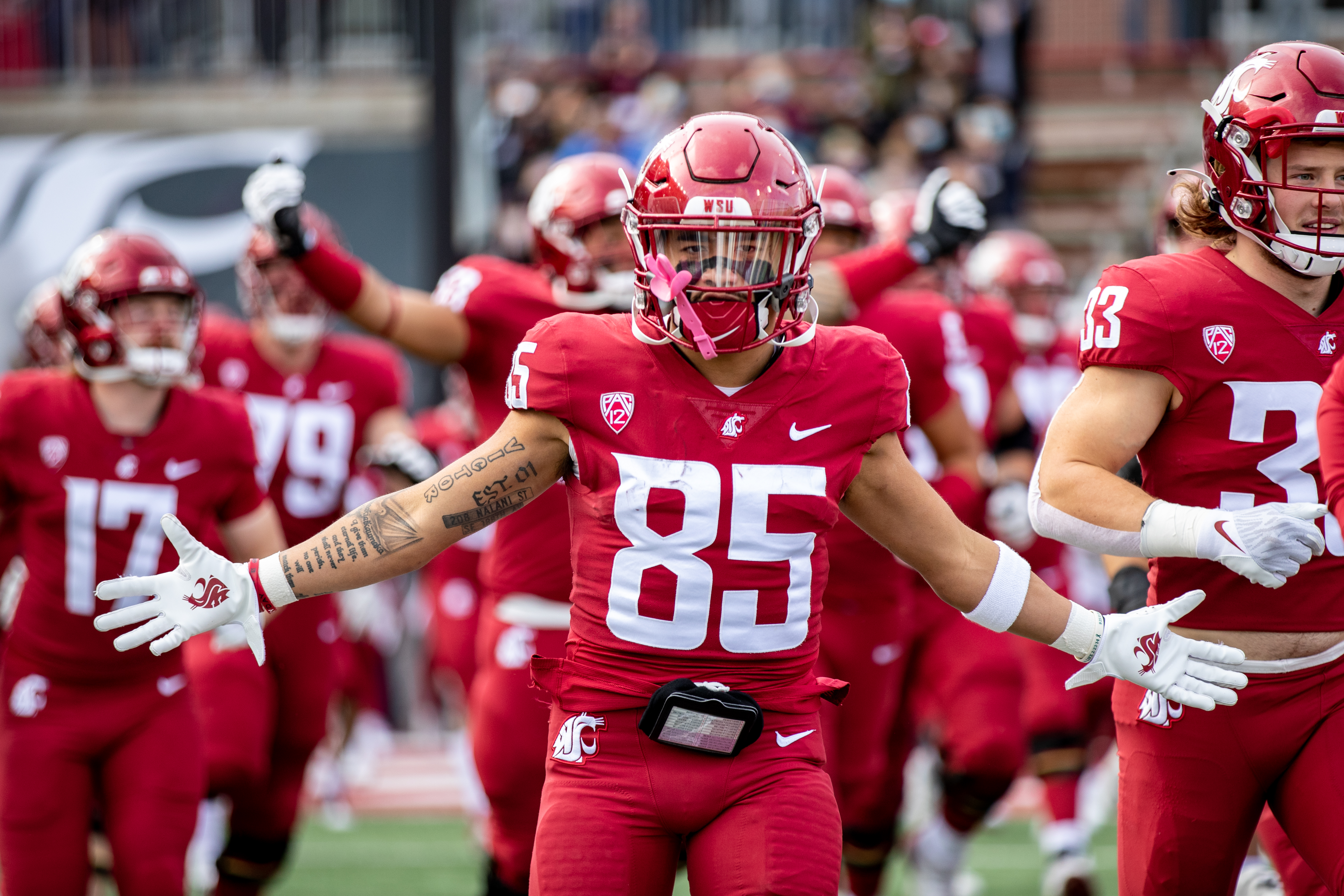 PULLMAN, WA - OCTOBER 23: Washington State wide receiver Lincoln Victor (85) runs out of the tunnel prior to a non-conference matchup between the BYU Cougars and the Washington State Cougars on October 23, 2021, at Martin Stadium in Pullman, WA.