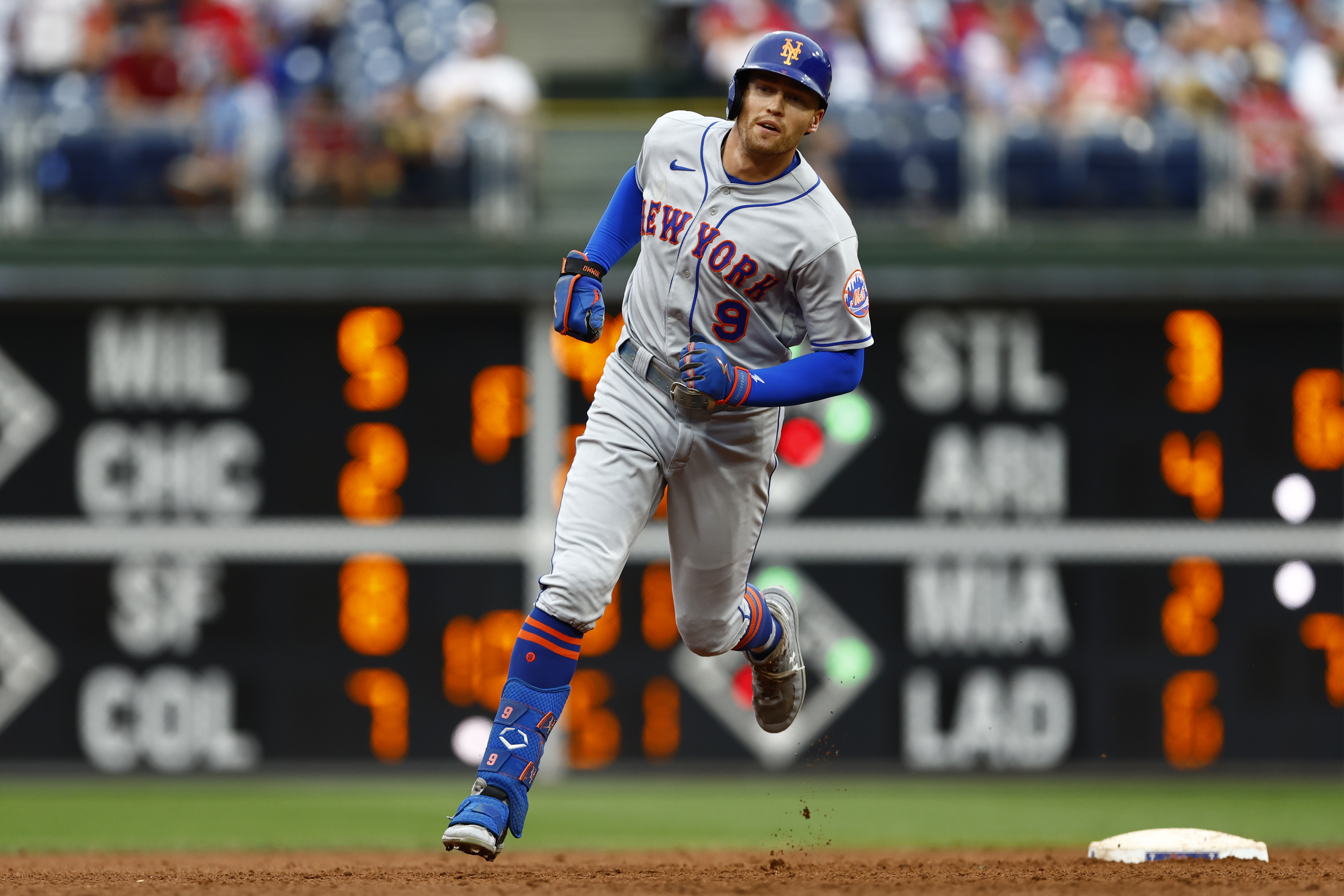 Brandon Nimmo #9 of the New York Mets rounds the bases after he hit a home run against the Philadelphia Phillies during the ninth inning of a game at Citizens Bank Park on August 21, 2022 in Philadelphia, Pennsylvania. The Mets defeated the Phillies 10-9.