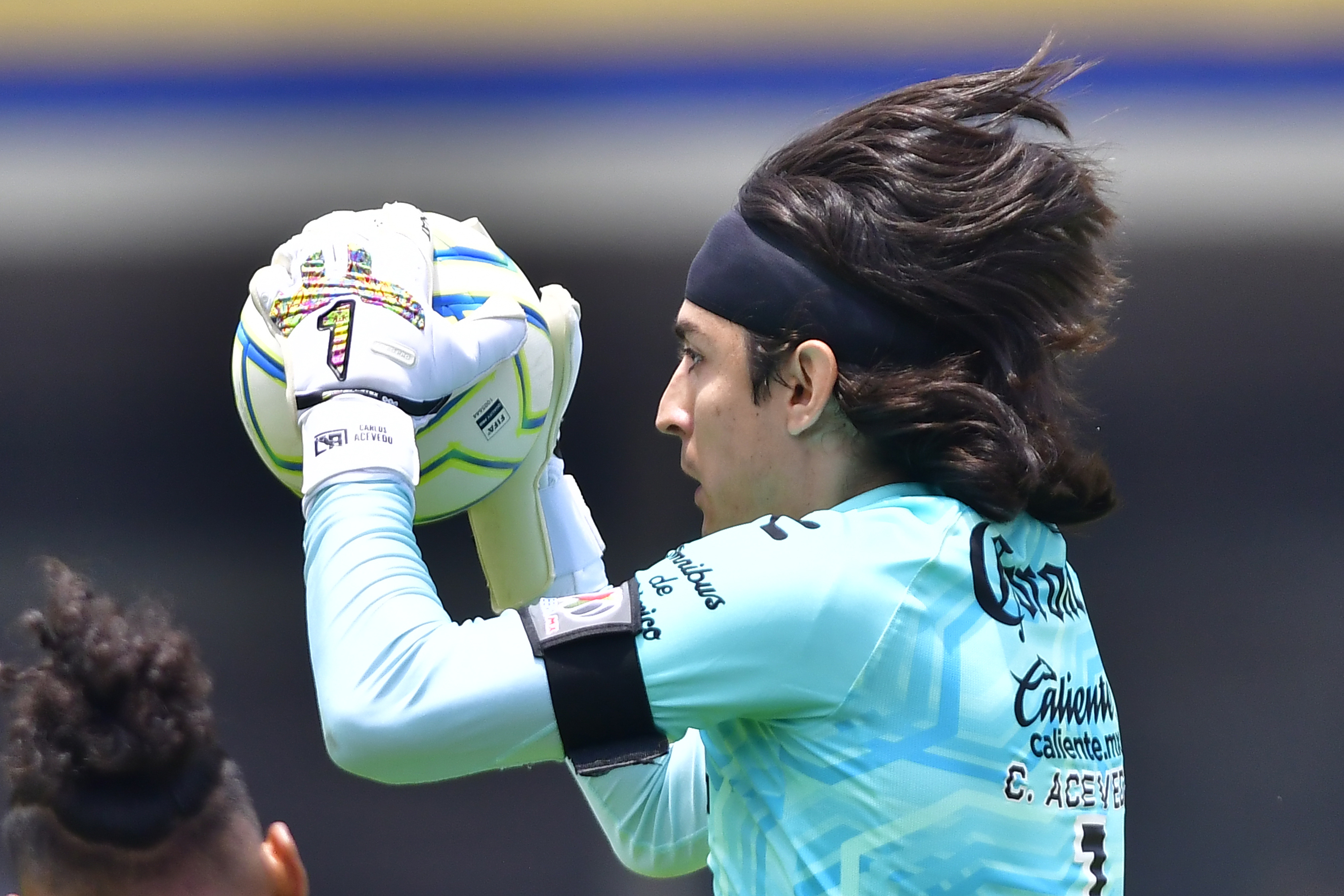 Carlos Acevedo Goalkeeper of Santos holds the ball during the 10th round match between Pumas UNAM and Santos Laguna as part of the Torneo Apertura 2022 Liga MX at Olimpico Universitario Stadium on August 21, 2022 in Mexico City, Mexico.
