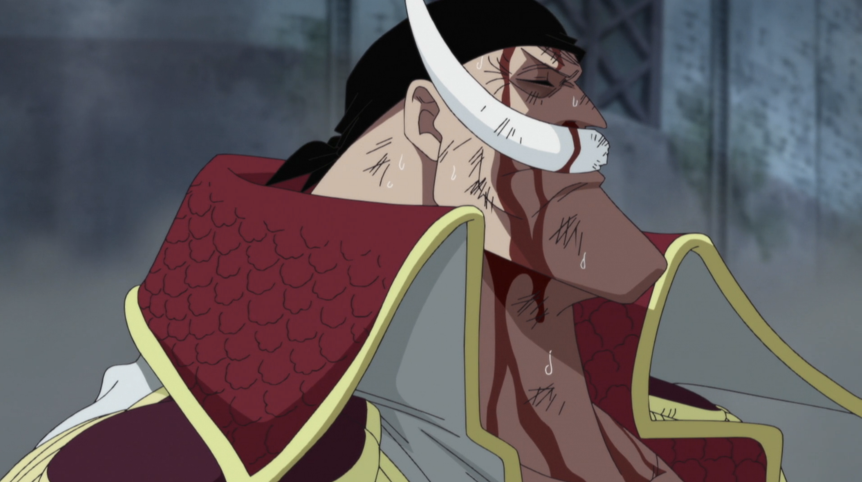 An image of white beard the pirate from the anime One Piece. Blood streams down his face.