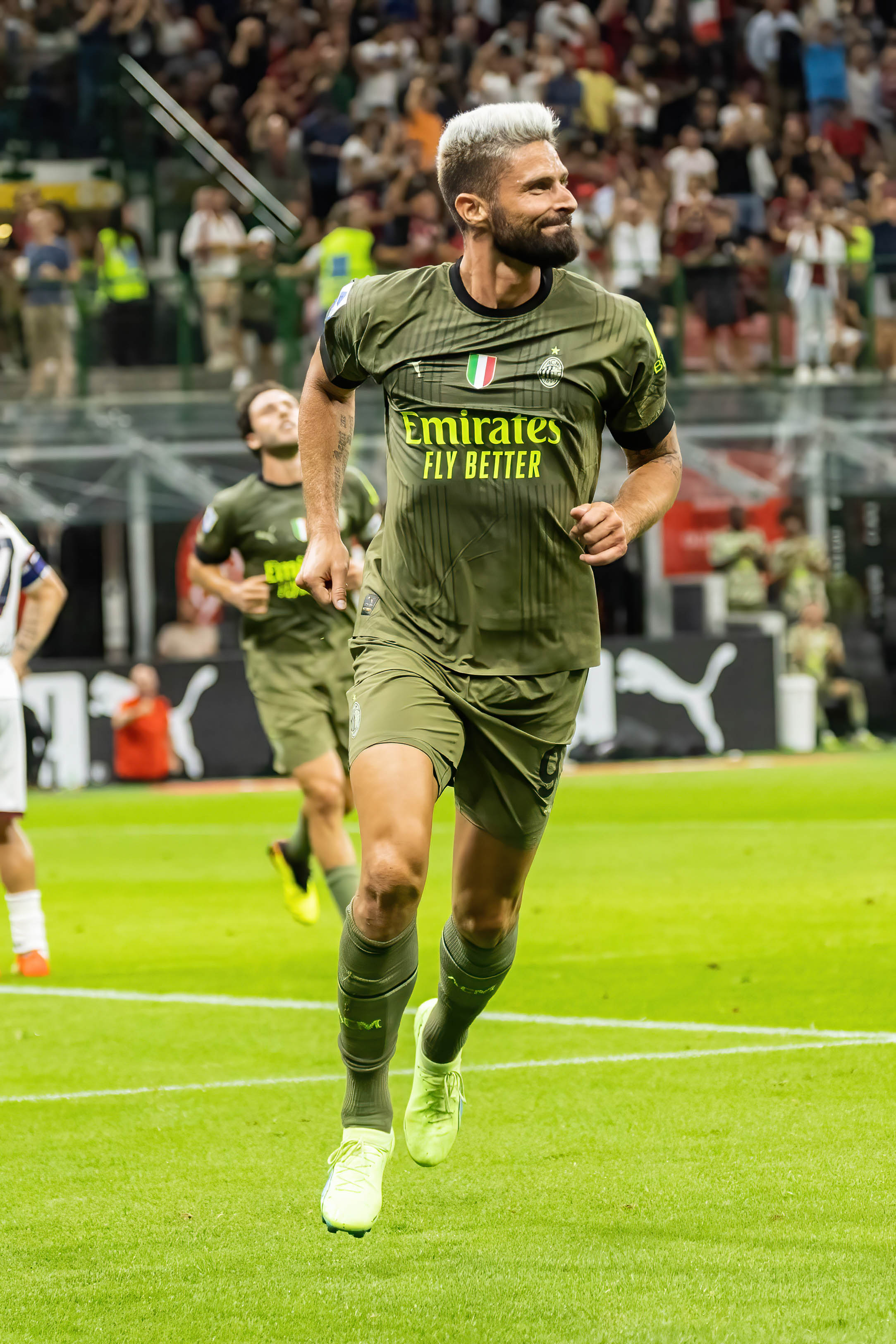 Olivier Giroud of AC Milan celebrates after scoring a goal...