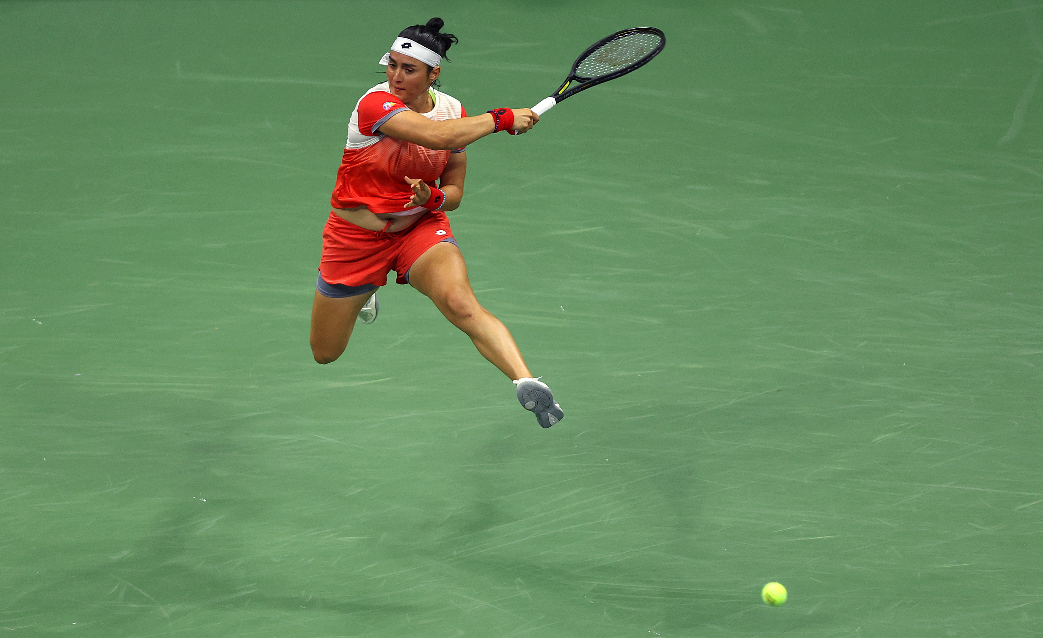 Ons Jabeur of Tunisia returns the ball with a flying forehand against Veronika Kudermetova during their Women’s Singles Fourth Round match on Day Seven of the 2022 US Open at USTA Billie Jean King National Tennis Center on September 04, 2022 in the Flushing neighborhood of the Queens borough of New York City.