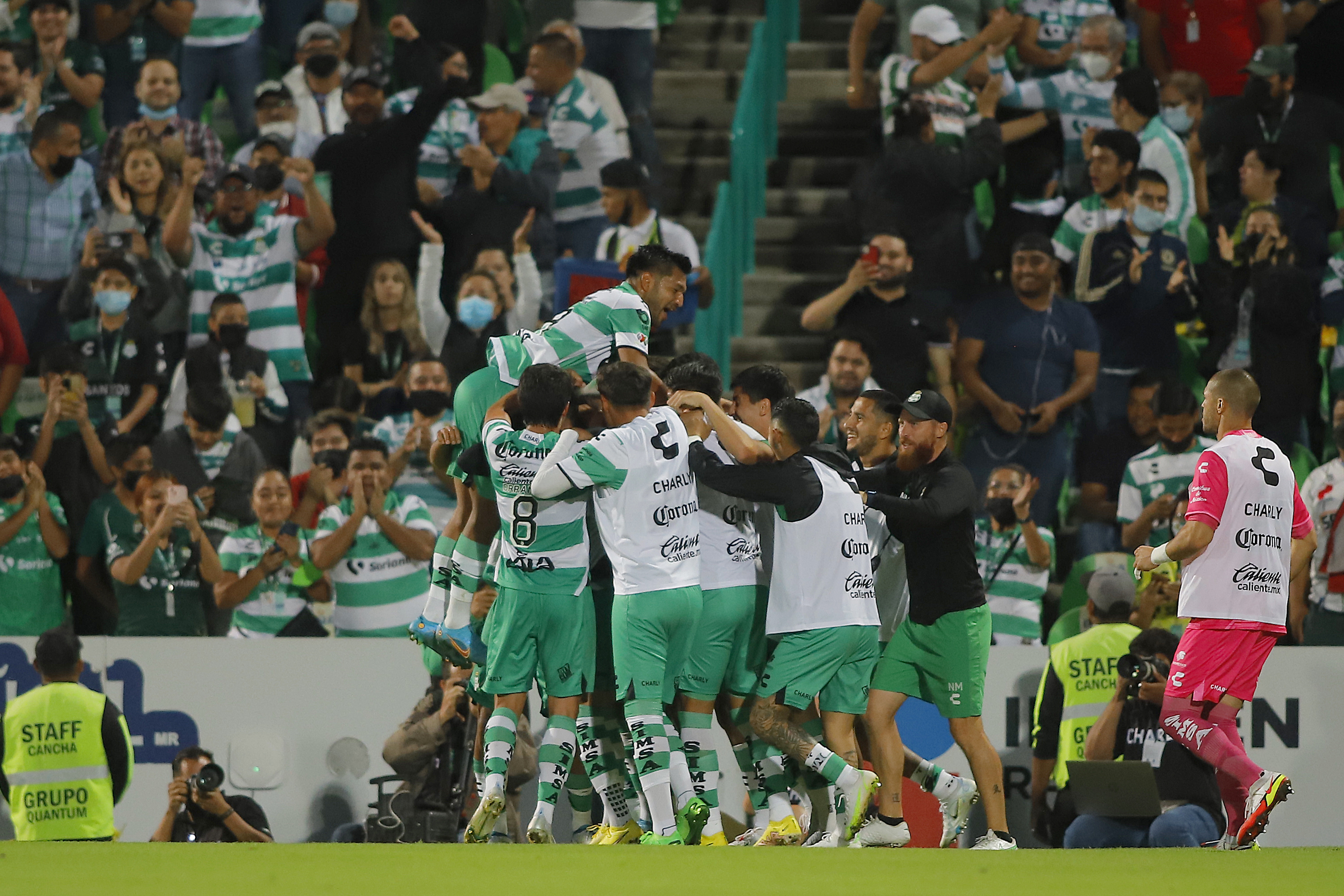 Diego Medina of Santos celebrates with teammates after scoring the second goal of his team during the 13th round match between Santos Laguna and Necaxa as part of the Torneo Apertura 2022 Liga MX at Corona Stadium on September 6, 2022 in Torreon, Mexico.