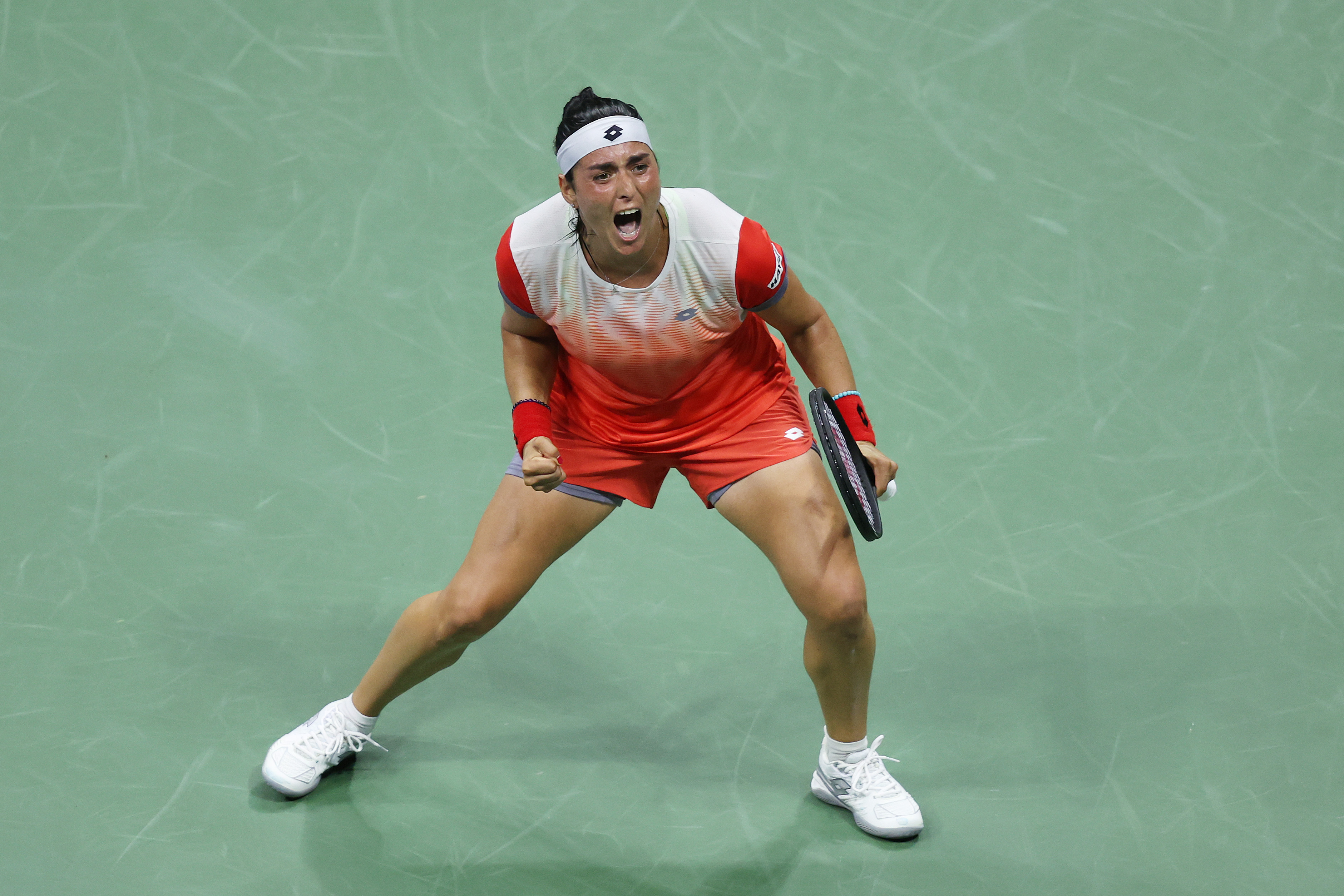 Ons Jabeur of Tunisia celebrates after defeating Caroline Garcia of France during their Women’s Singles Semifinal match on Day Eleven of the 2022 US Open at USTA Billie Jean King National Tennis Center on September 08, 2022 in the Flushing neighborhood of the Queens borough of New York City.