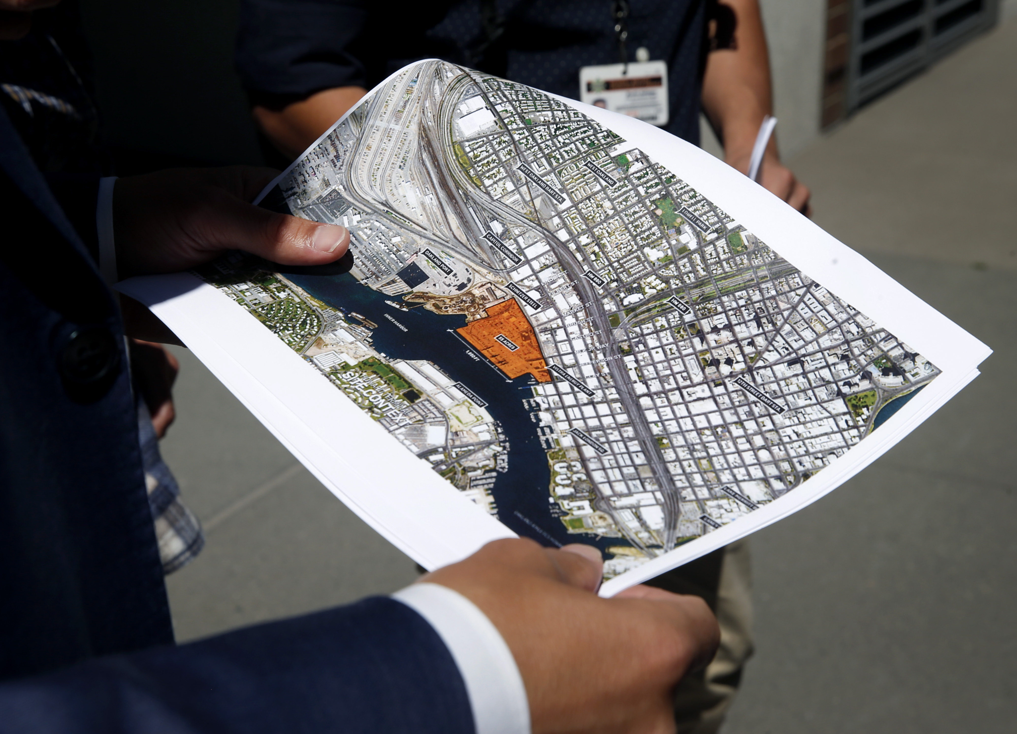 Oakland A’s President Dave Kaval displays a map of the Howard Terminal site and surrounding area in Oakland, Calif. on Tuesday, Sept. 3, 2019 where the baseball team is hoping to build its new stadium.