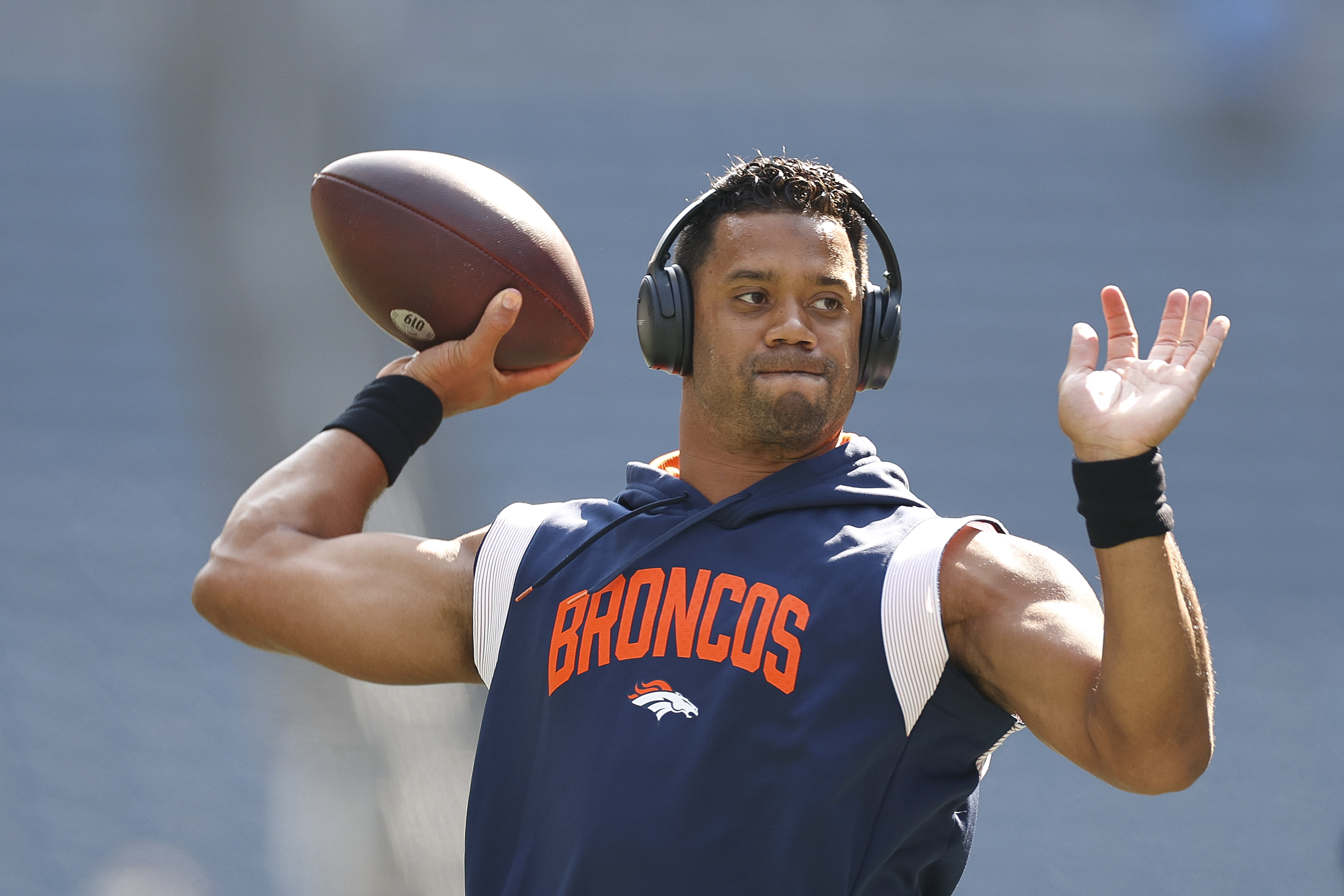 Russell Wilson #3 of the Denver Broncos warms up before playing against the Seattle Seahawks