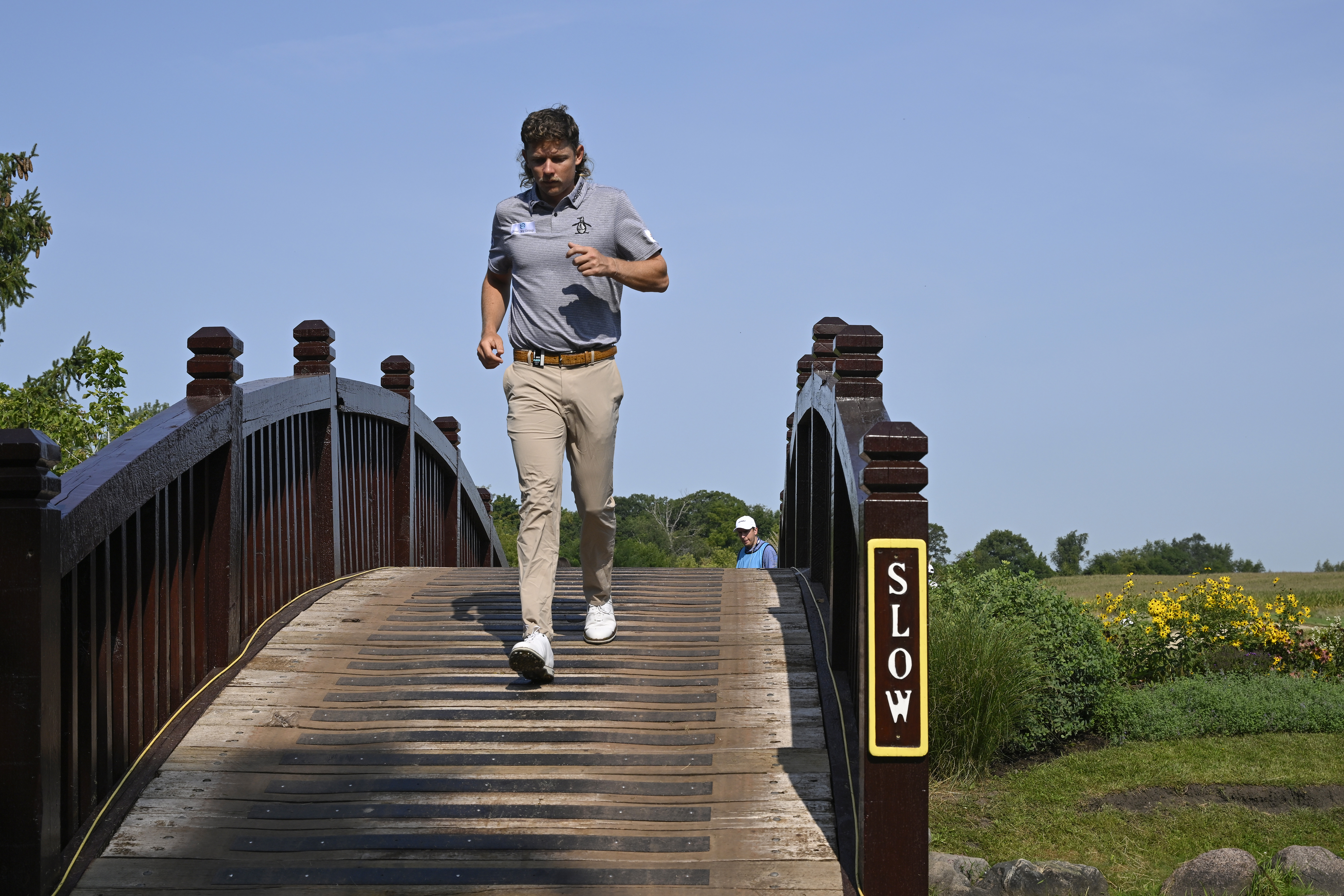 Team Captain Cameron Smith of Punch GC crosses a bridge to the sixth tee during the pro-am prior to the LIV Golf Invitational - Chicago at Rich Harvest Farms on September 15, 2022 in Sugar Grove, Illinois.