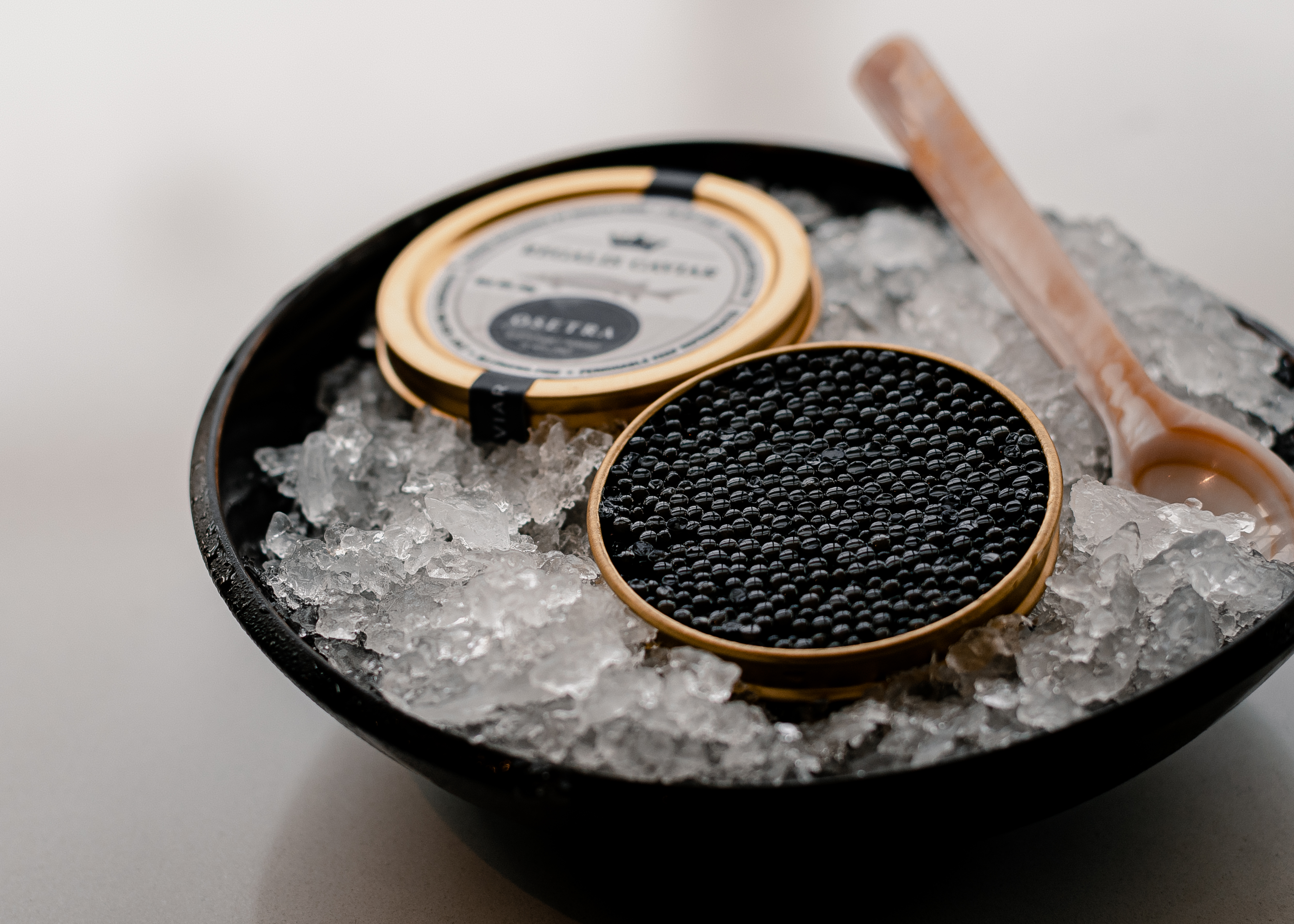 Caviar in a tin on ice.