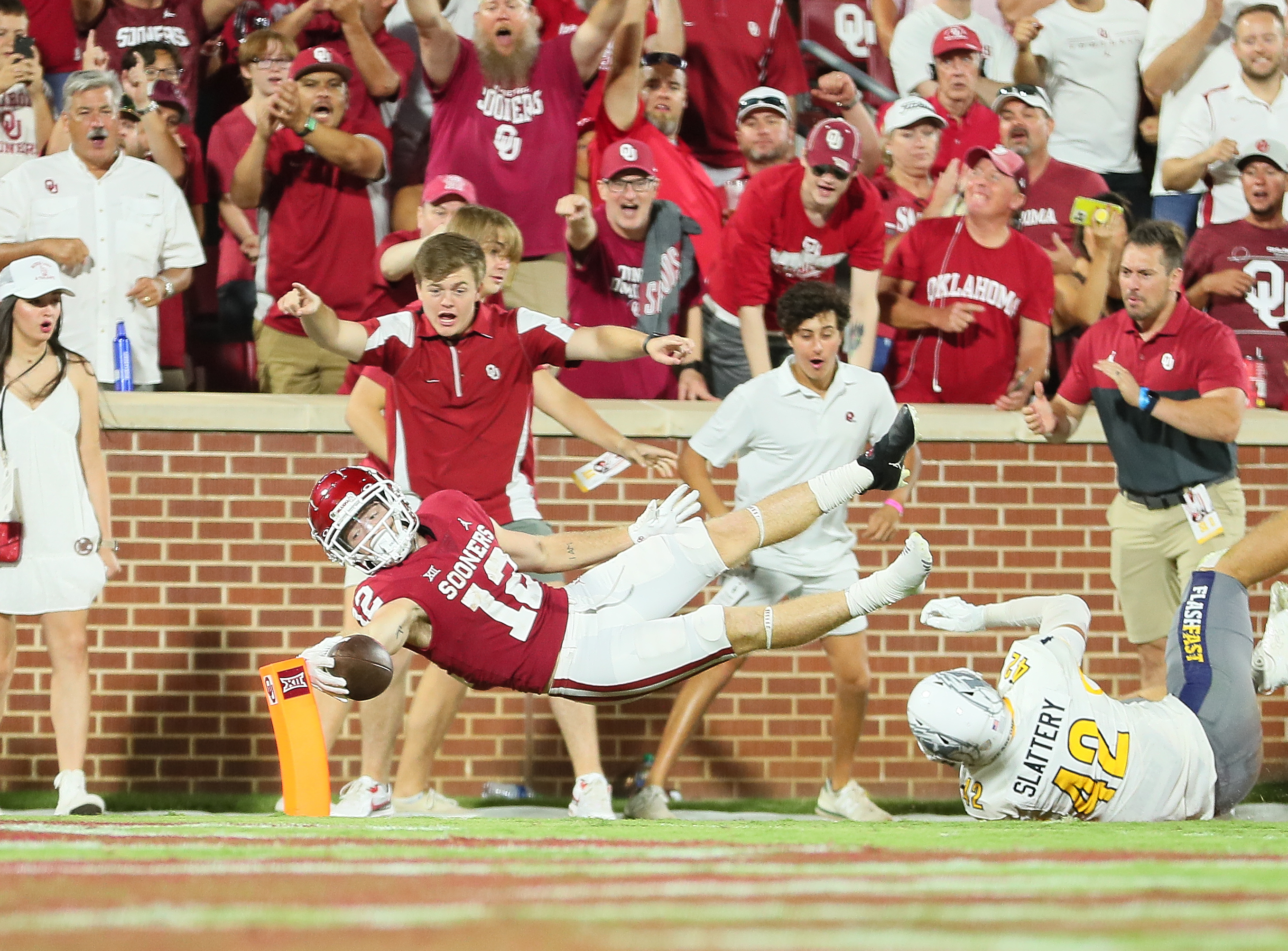 Oklahoma Sooners WR Drake Stoops (12) makes a reach for the goal line during a game between the Oklahoma Sooners and the Kent State Golden Flashes at Gaylord Memorial Stadium in Norman, Oklahoma on September 10, 2022.