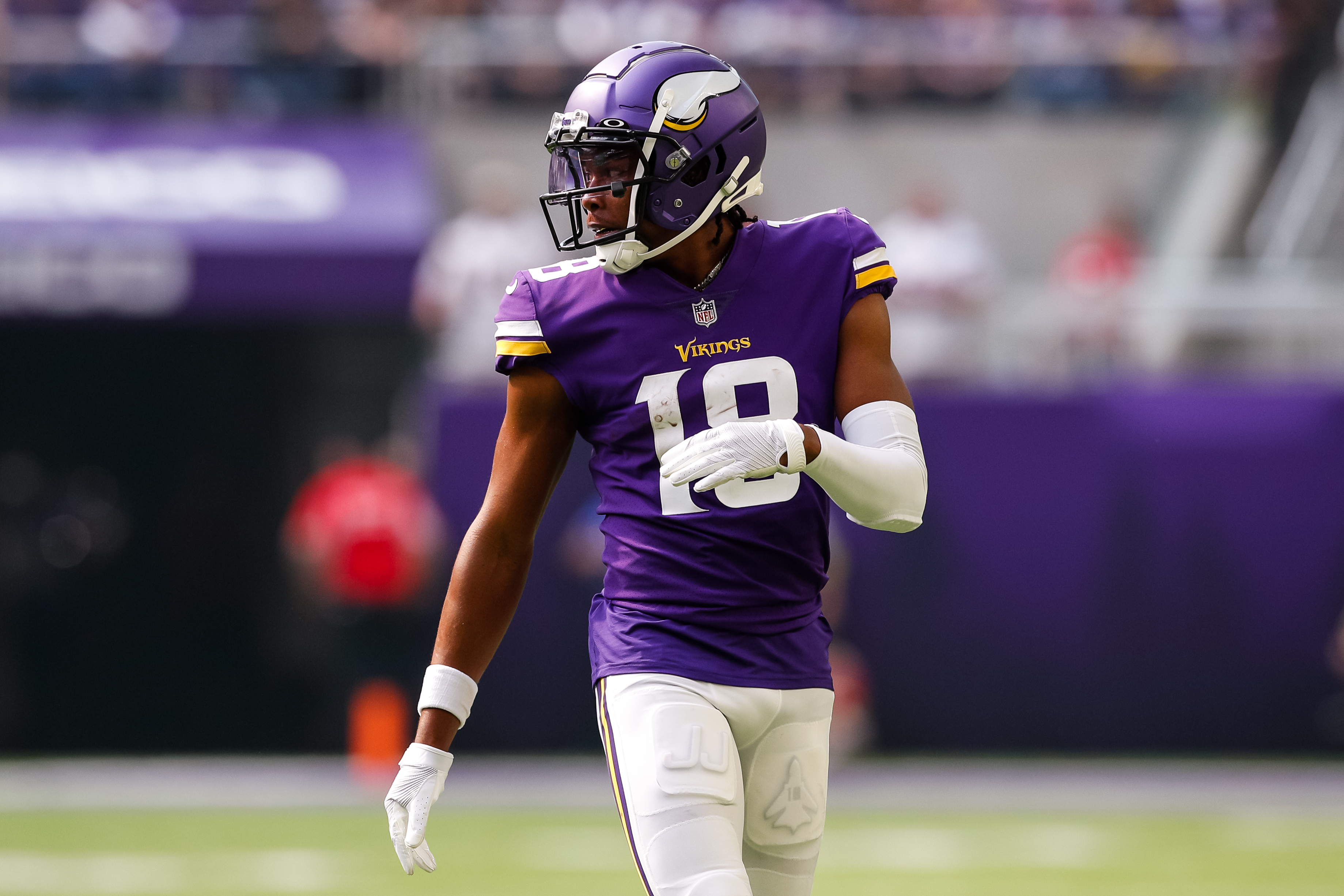 MINNEAPOLIS, MN - SEPTEMBER 11: Justin Jefferson #18 of the Minnesota Vikings looks on against the Green Bay Packers in the first quarter of the game at U.S. Bank Stadium on September 11, 2022 in Minneapolis, Minnesota. The Vikings defeated the Packers 23-7.
