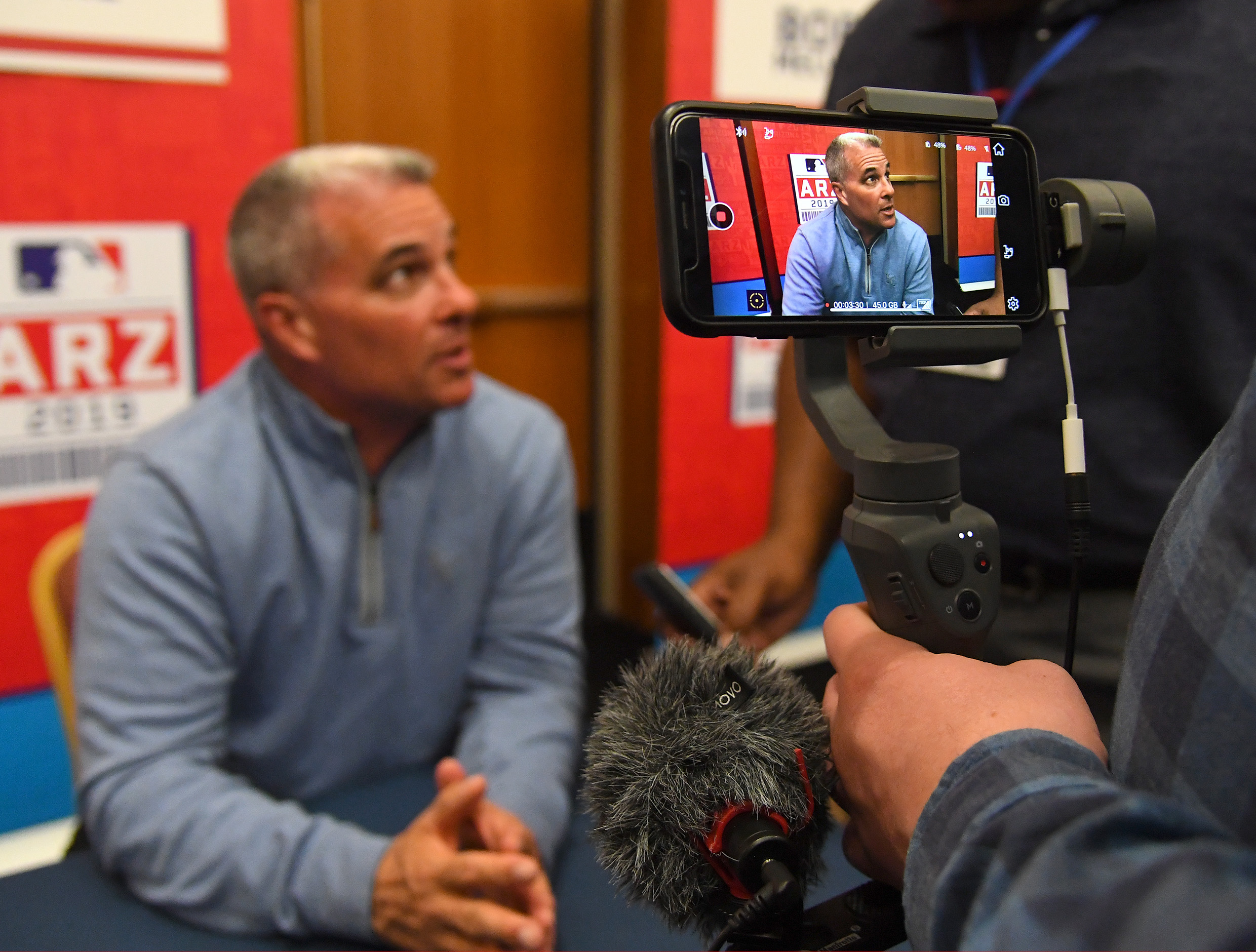 Kansas City Royals Senior Vice President of Baseball Operations and General Manager Dayton Moore speaks to the media during spring training media day at the Glendale Civic Center.