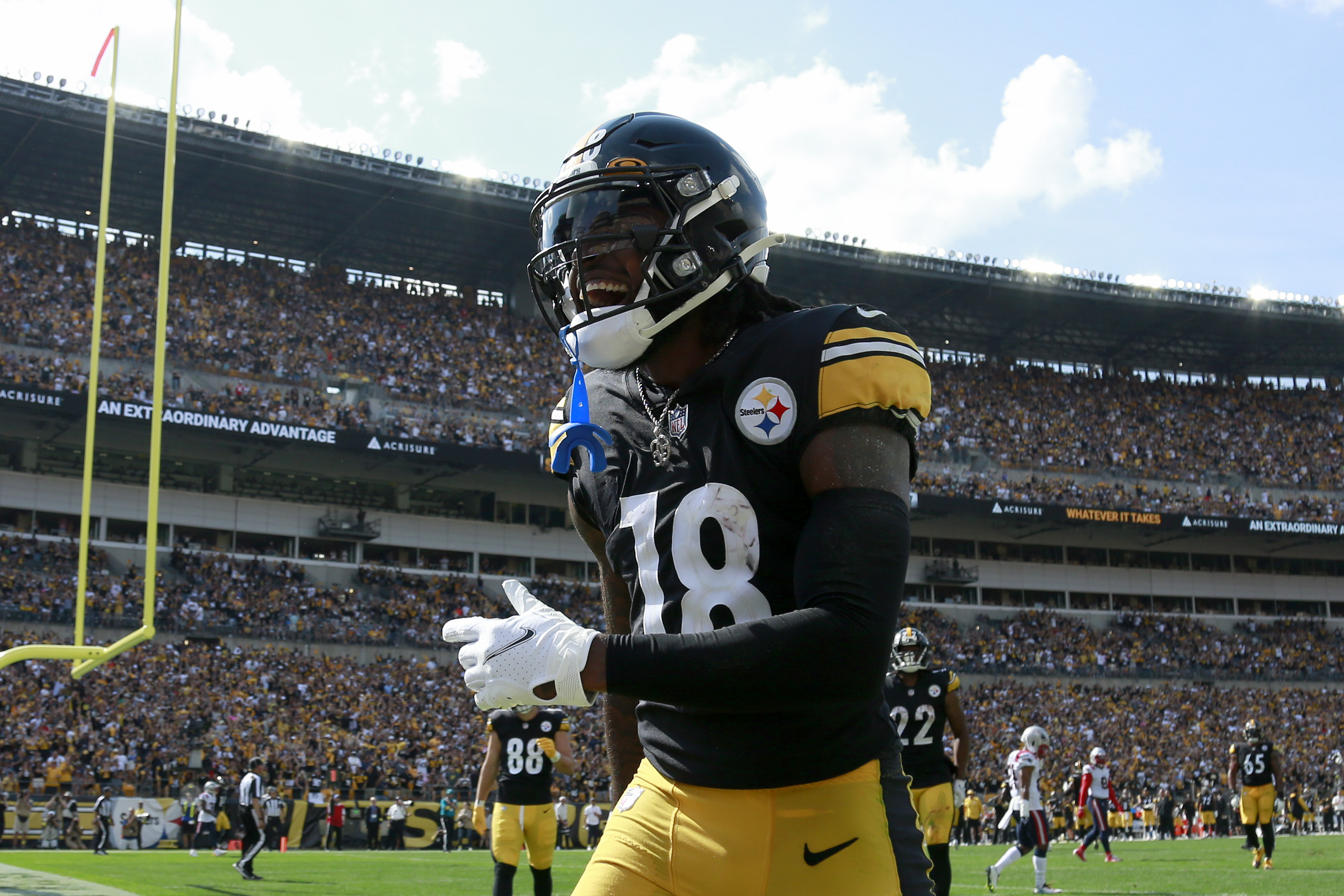 Diontae Johnson #18 of the Pittsburgh Steelers celebrates after a two point conversion during the second half gane at Acrisure Stadium on September 18, 2022 in Pittsburgh, Pennsylvania.