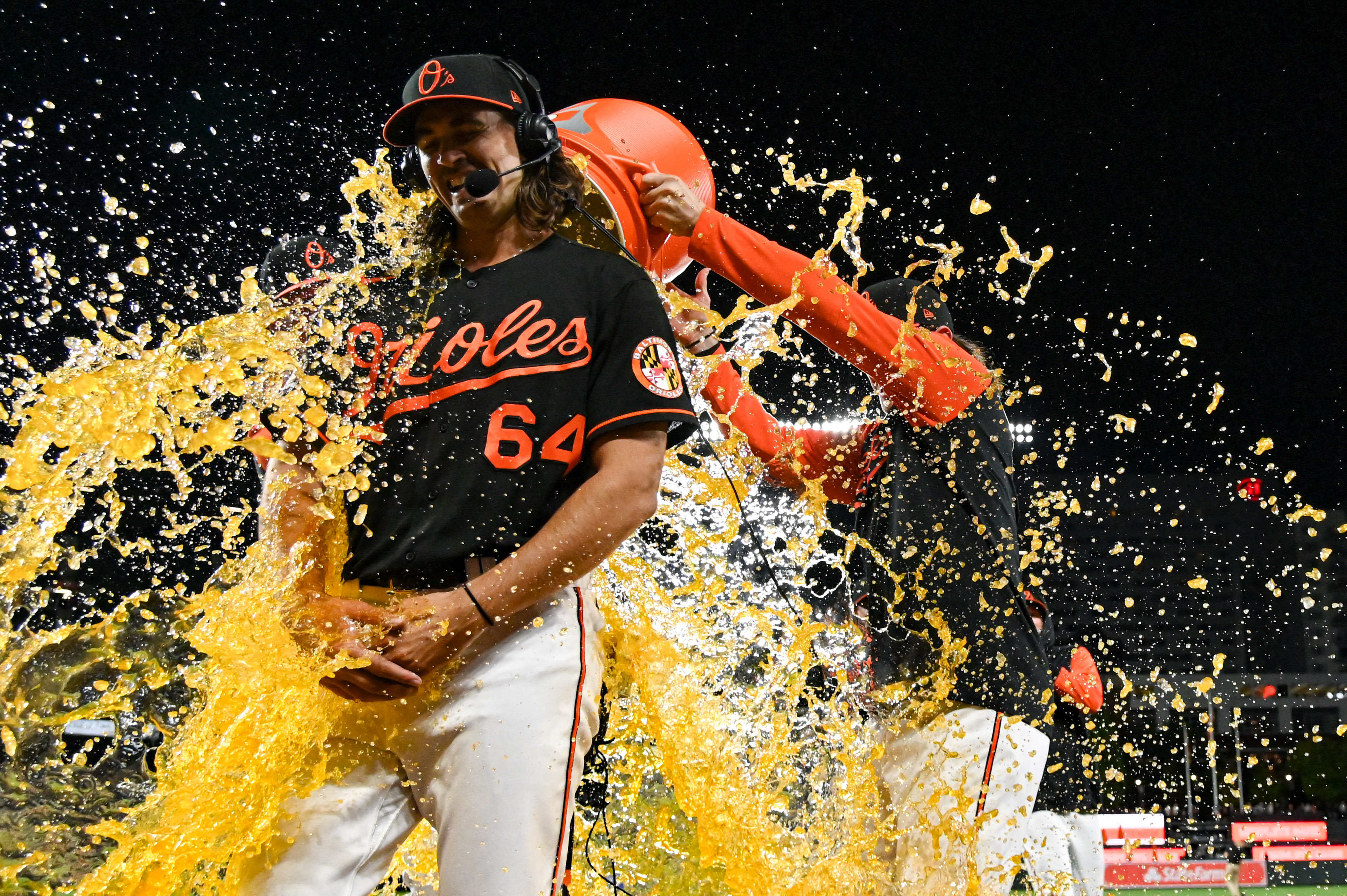 Orioles pitcher Dean Kremer is doused in Gatorade following win over Astros