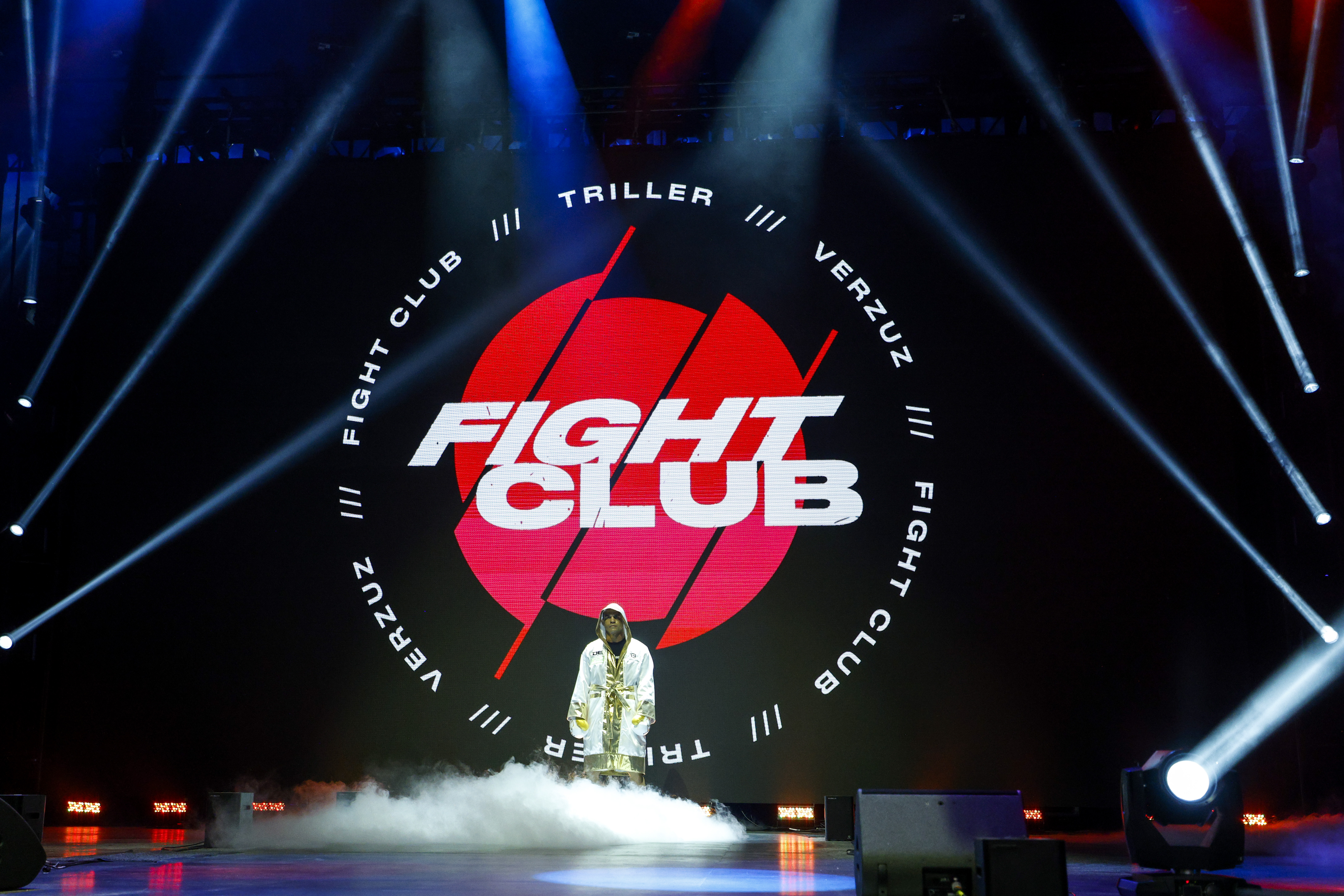 Vitor Belfort won’t fight on October 22nd, but doesn’t he look great in front of this giant Triller logo? 
