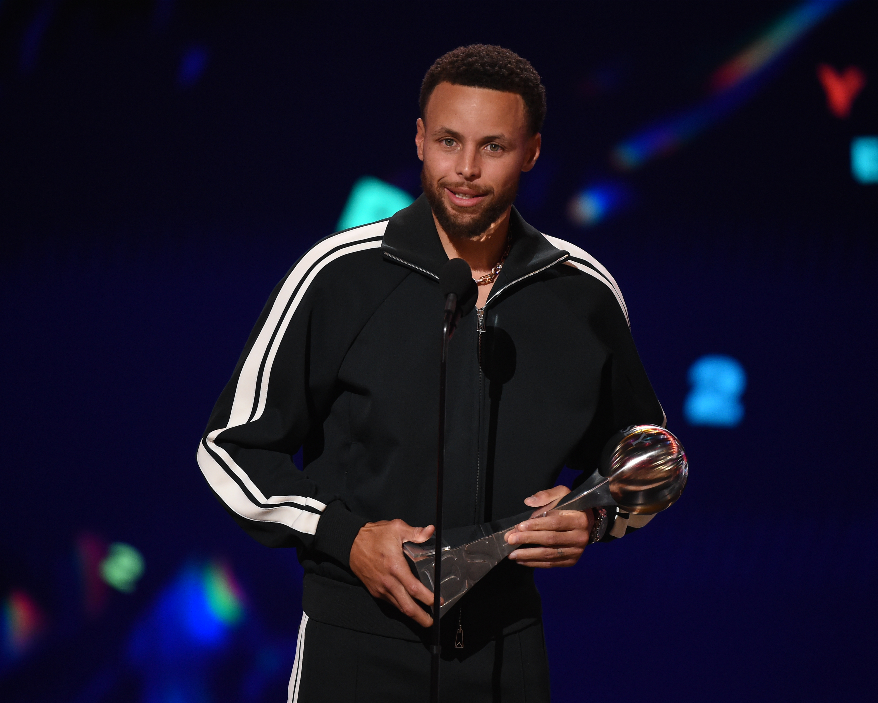 Steph Curry in front of a microphone at the 2022 ESPYs