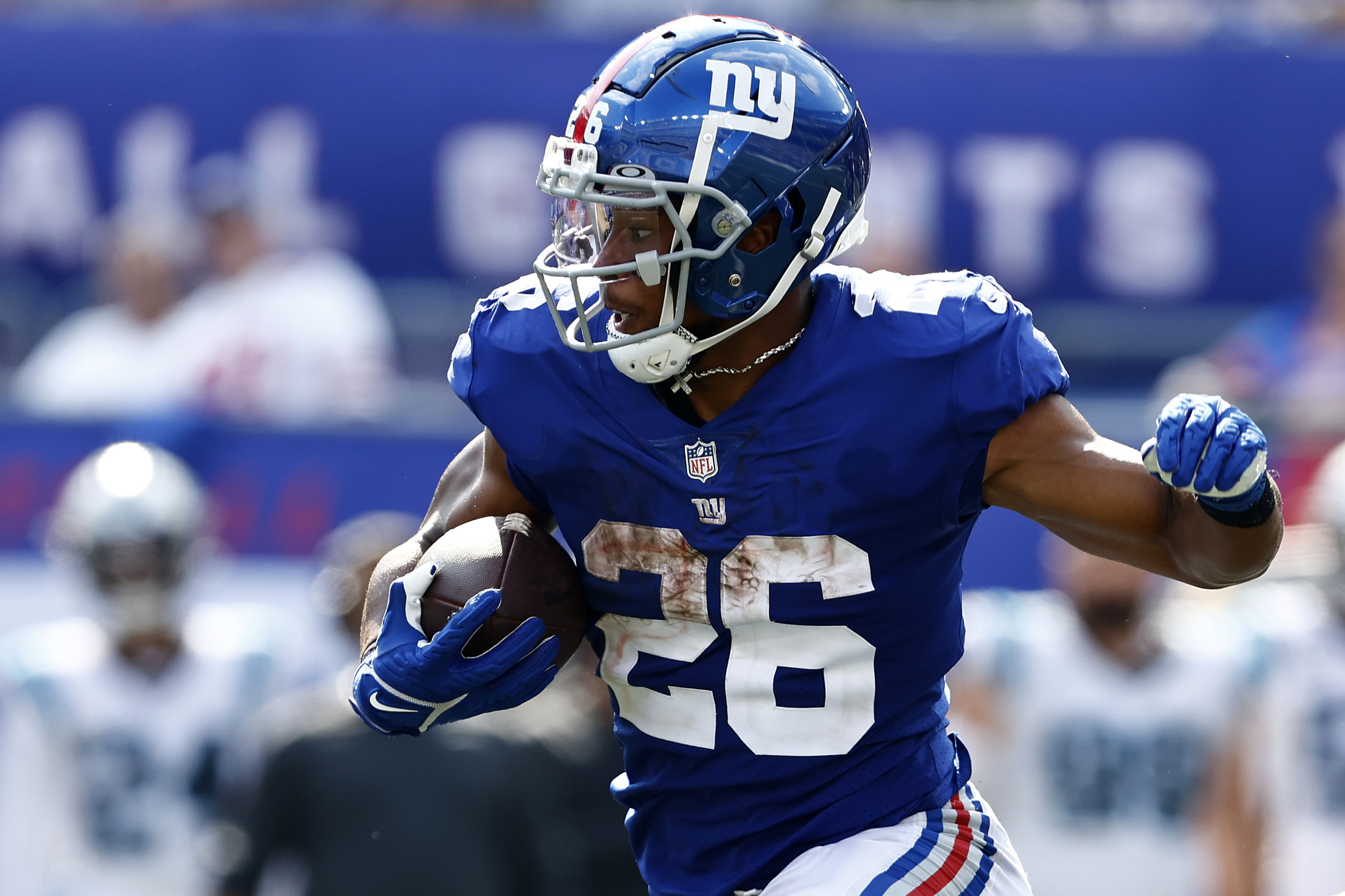 Saquon Barkley #26 of the New York Giant rushes the ball in the second half of the game against the Carolina Panthers at MetLife Stadium on September 18, 2022 in East Rutherford, New Jersey.