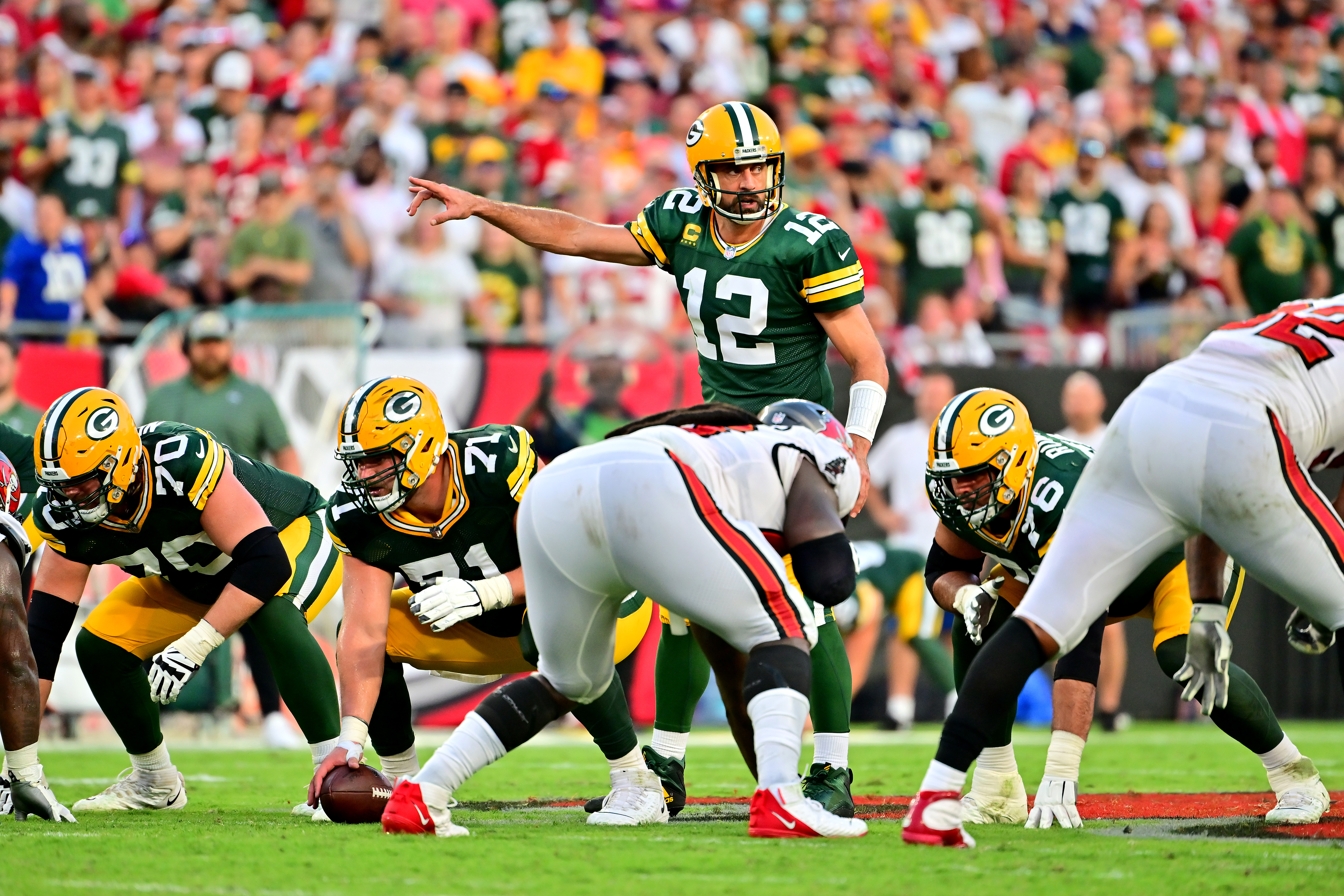 Aaron Rodgers #12 of the Green Bay Packers calls a play against the Tampa Bay Buccaneers during the fourth quarter in the game at Raymond James Stadium on September 25, 2022 in Tampa, Florida.