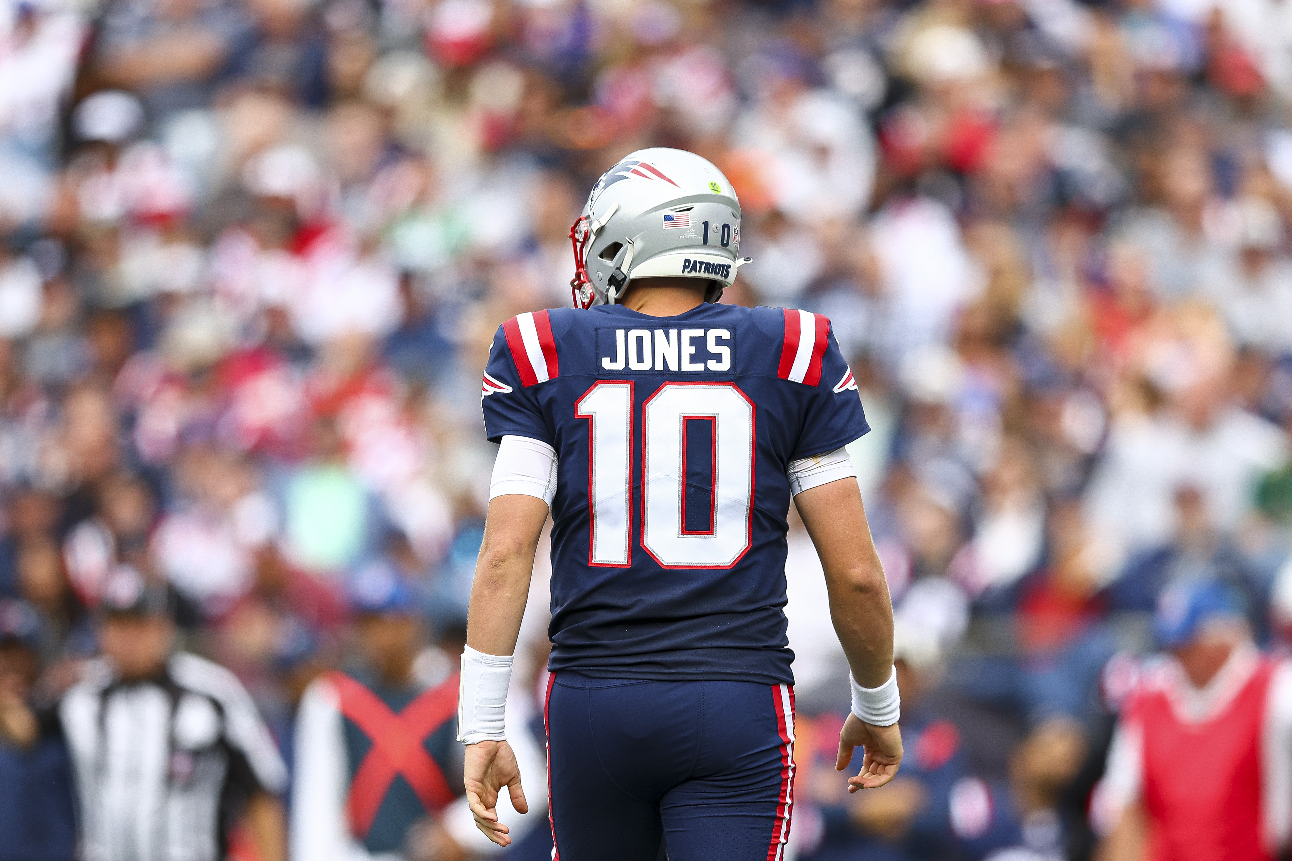 Mac Jones #10 of the New England Patriots looks on during the game against the Baltimore Ravens at Gillette Stadium on September 25, 2022 in Foxborough, Massachusetts.
