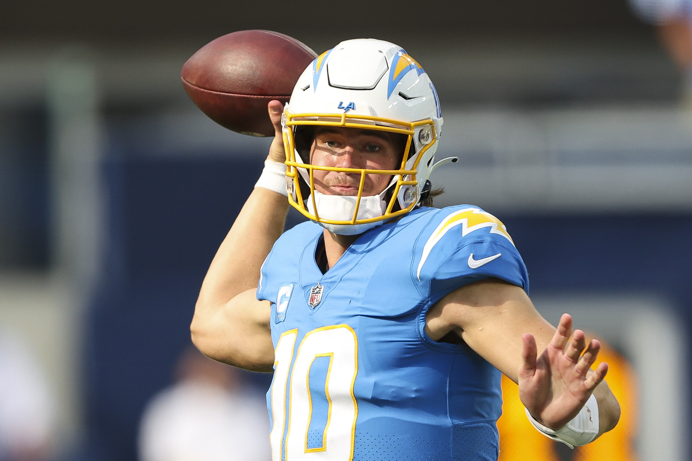 Justin Herbert #10 of the Los Angeles Chargers attempts a pass during the second half against the Jacksonville Jaguars at SoFi Stadium on September 25, 2022 in Inglewood, California.