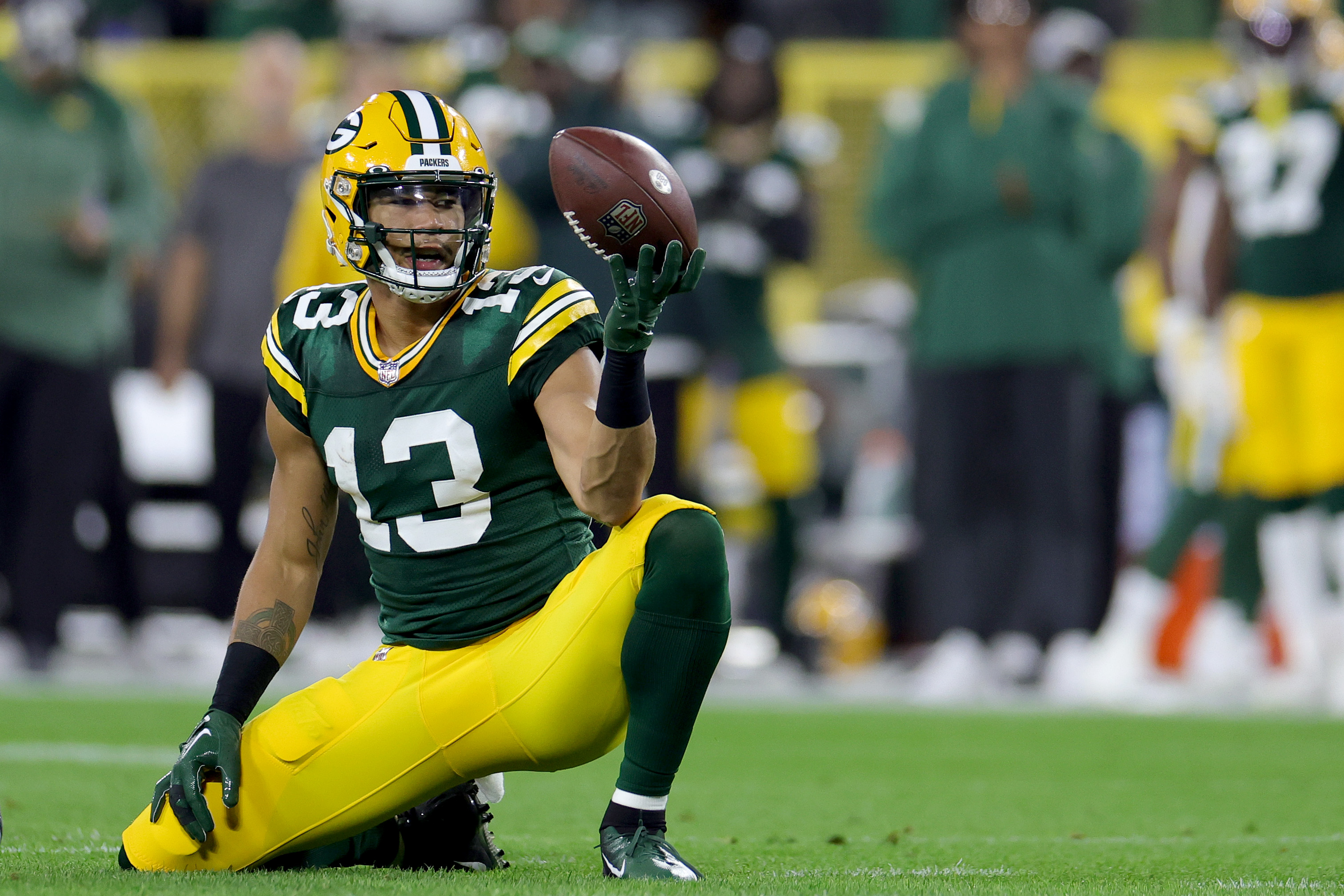 Allen Lazard #13 of the Green Bay Packers reacts after a first down during the first quarter in the game against the Chicago Bears at Lambeau Field on September 18, 2022 in Green Bay, Wisconsin.