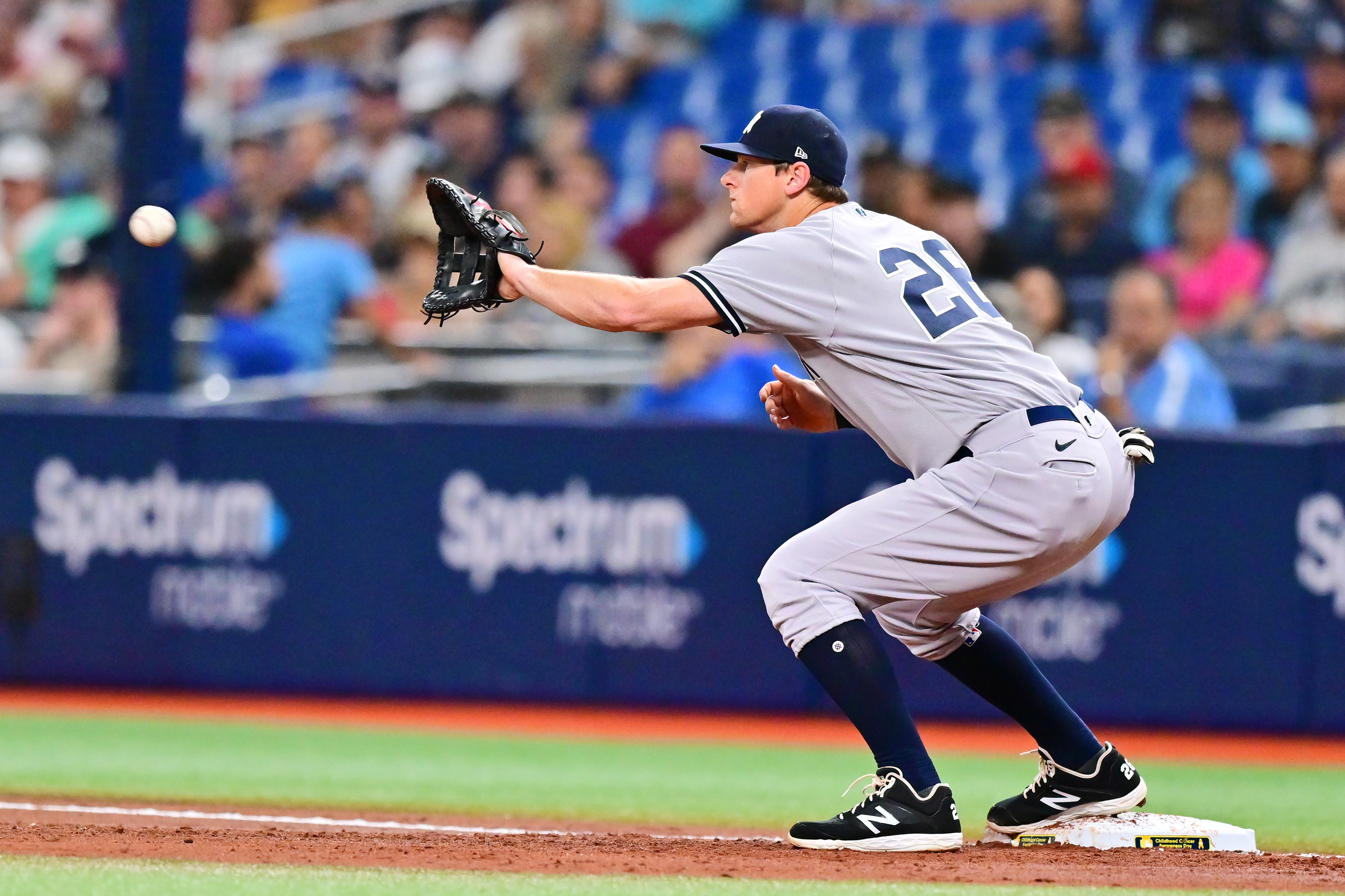 DJ LeMahieu #26 of the New York Yankees looks to catch the ball during a game against the Tampa Bay Rays at Tropicana Field on September 02, 2022 in St Petersburg, Florida.