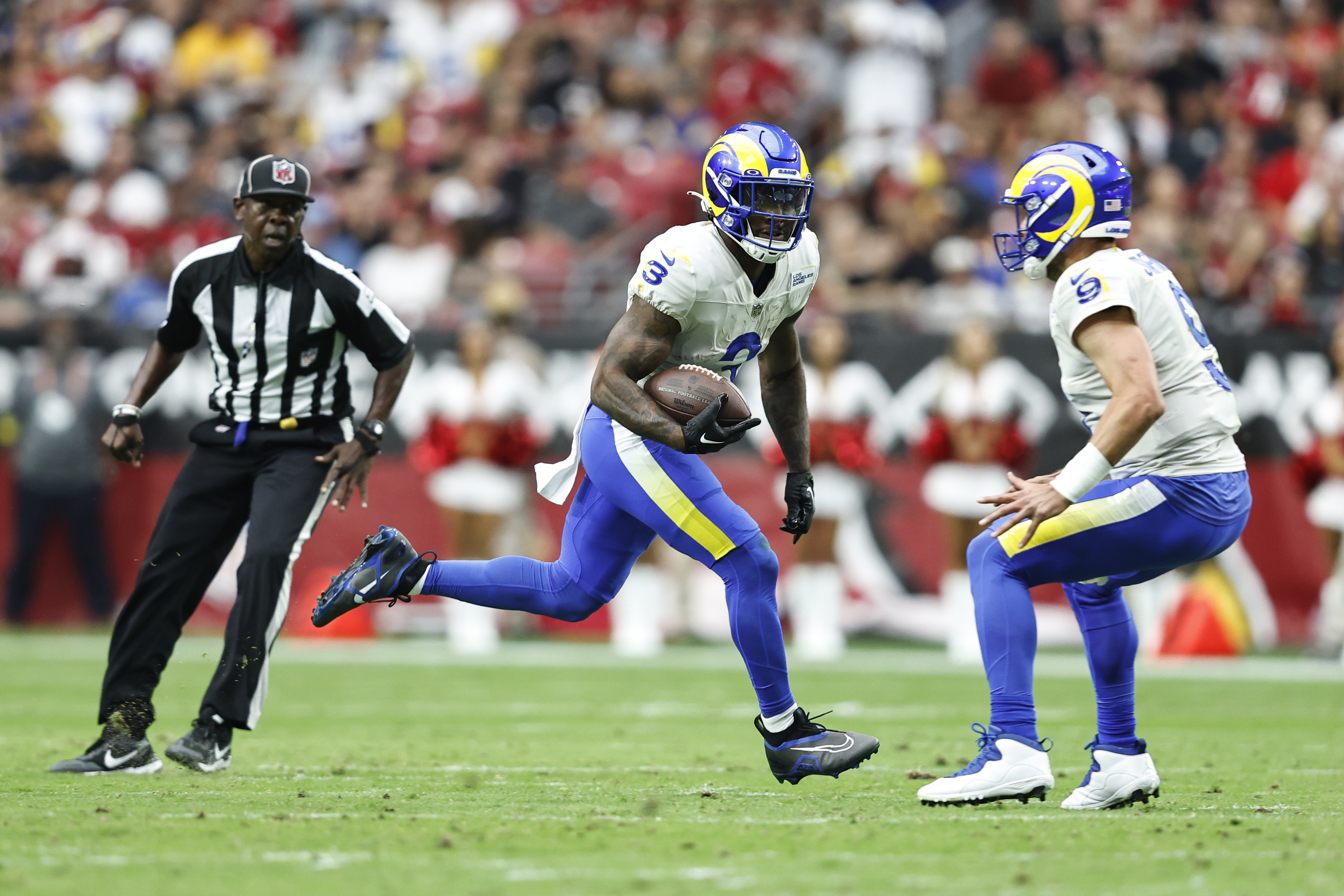 Cam Akers #3 of the Los Angeles Rams runs during an NFL football game between the Arizona Cardinals and the Los Angeles Rams at State Farm Stadium on September 25, 2022 in Glendale, Arizona. The Los Angeles Rams won 20-12.