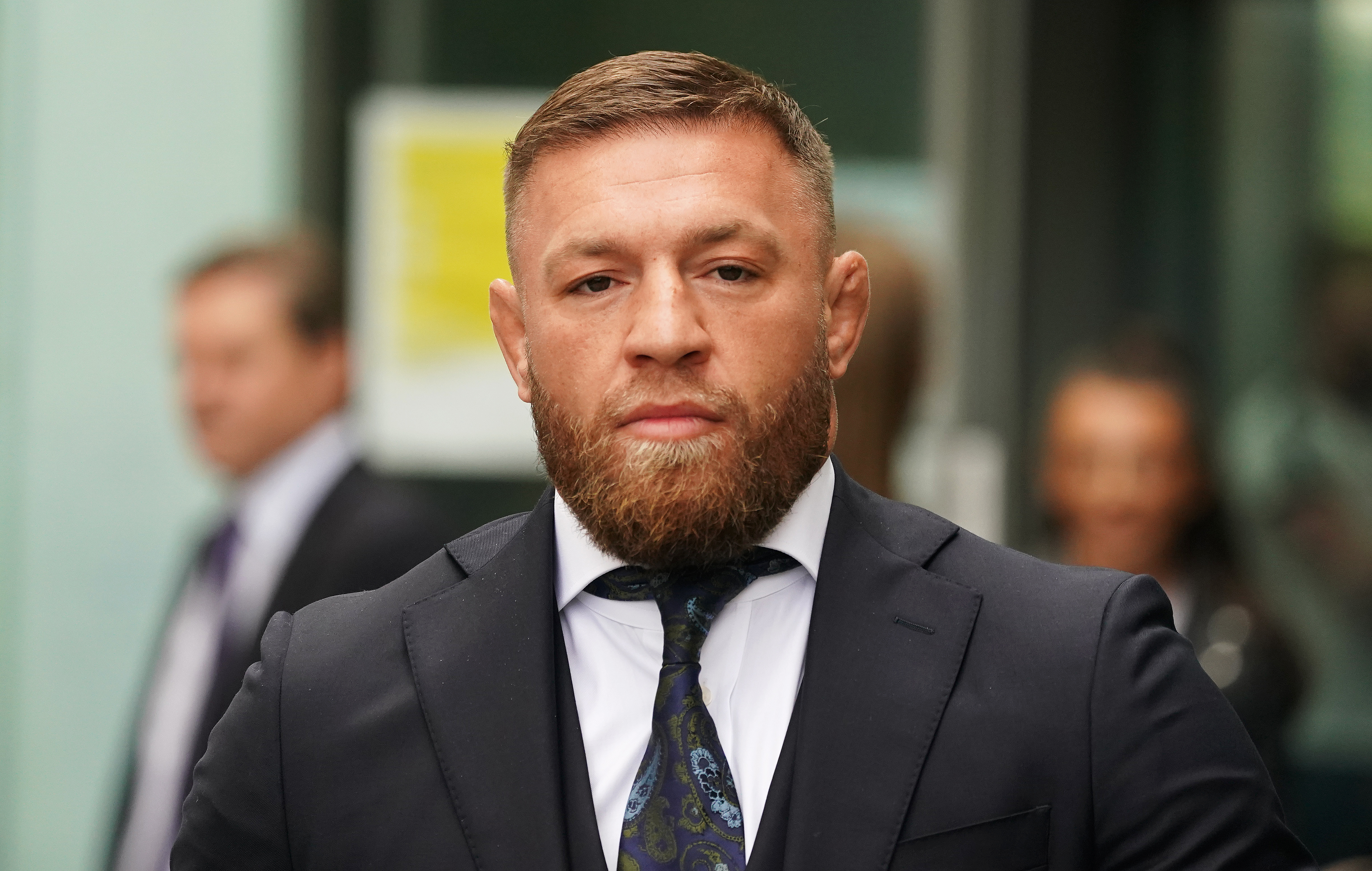 Conor McGregor leaving court over a driving offense.
