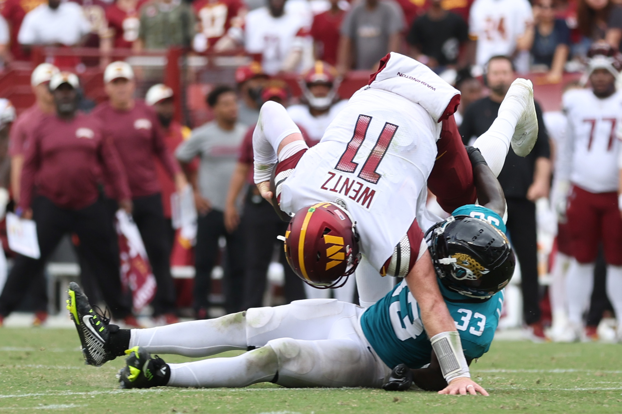 &nbsp;Devin Lloyd #33 of the Jacksonville Jaguars sacks Carson Wentz #11 of the Washington Commanders during the fourth quarter on a two point conversion attempt at FedExField on September 11, 2022 in Landover, Maryland.