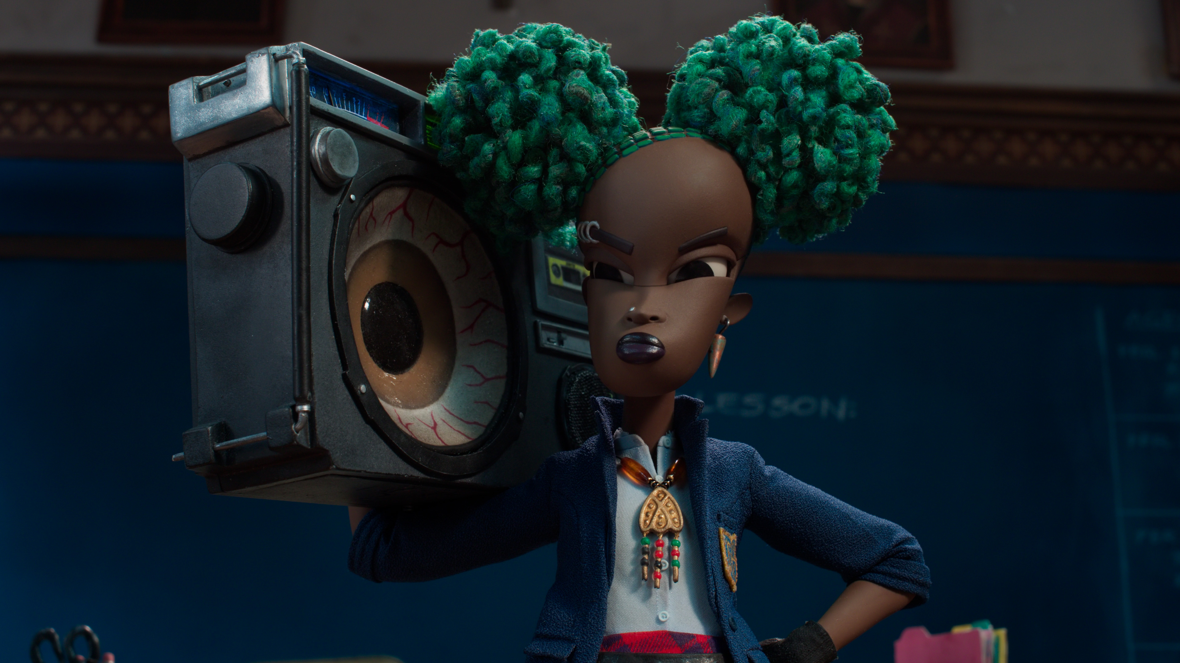 A girl with green afro puff hair holds a boombox with a gigantic eye poking out of one of its speakers on her shoulder.