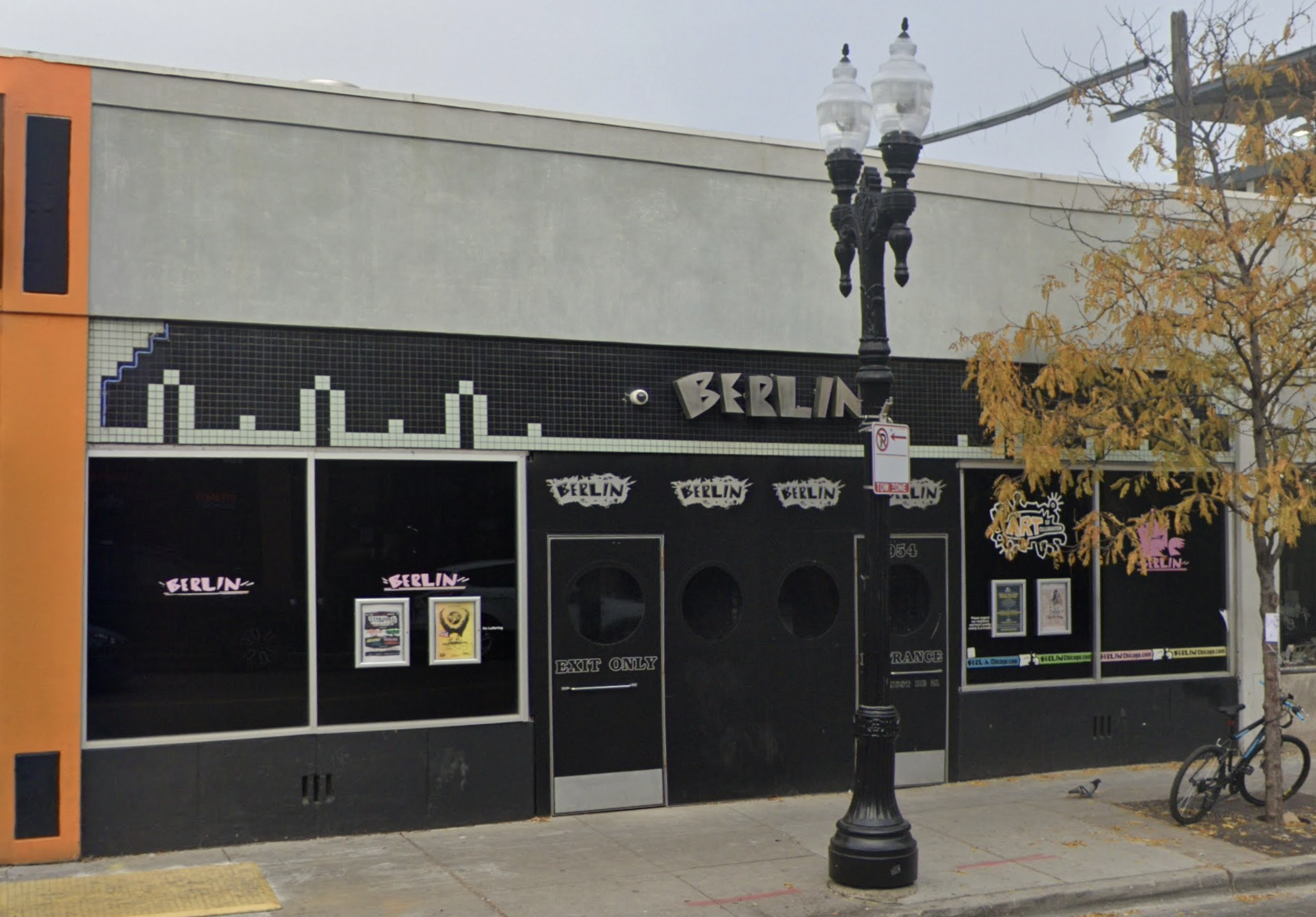 The exterior of a black-and-grey nightclub with a sign that reads “Berlin.”
