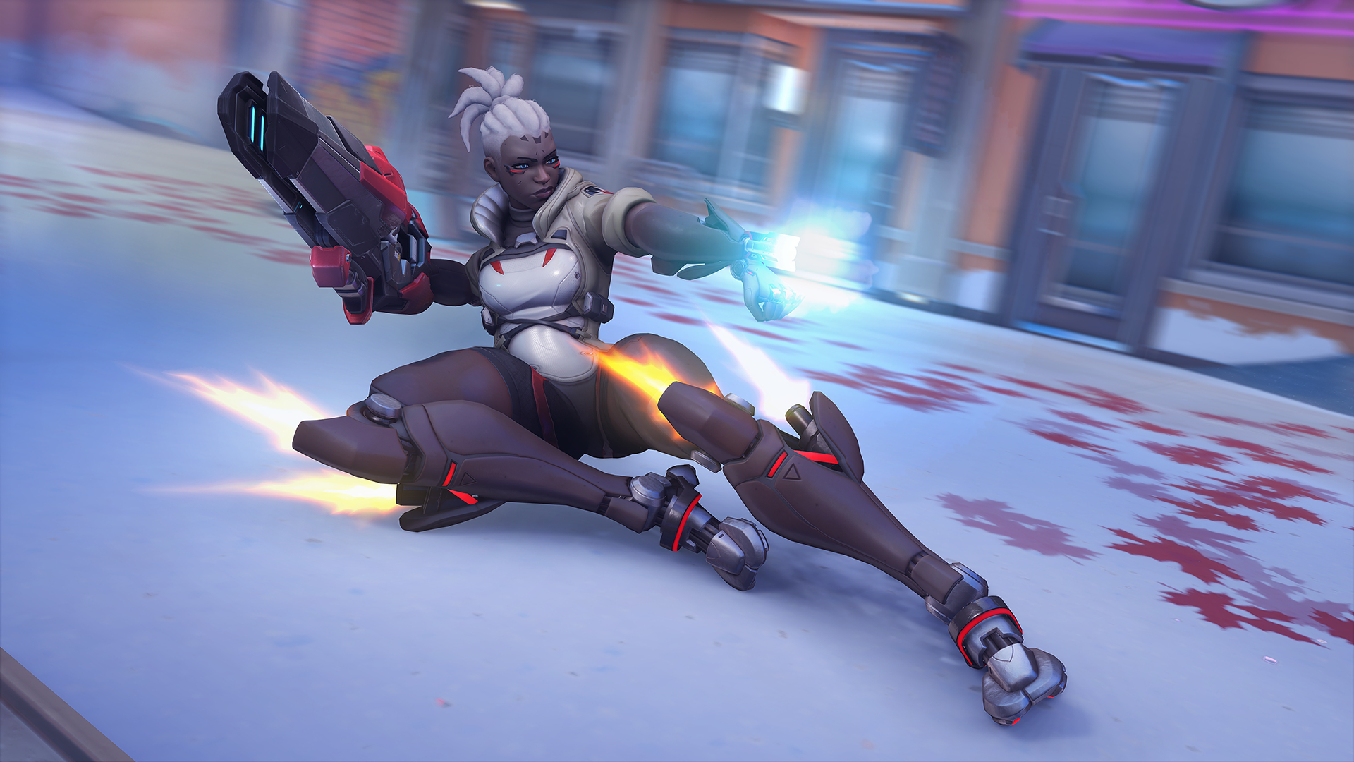 Sojourn, a cyborg women with a big gun, slides on the ground in Overwatch 2