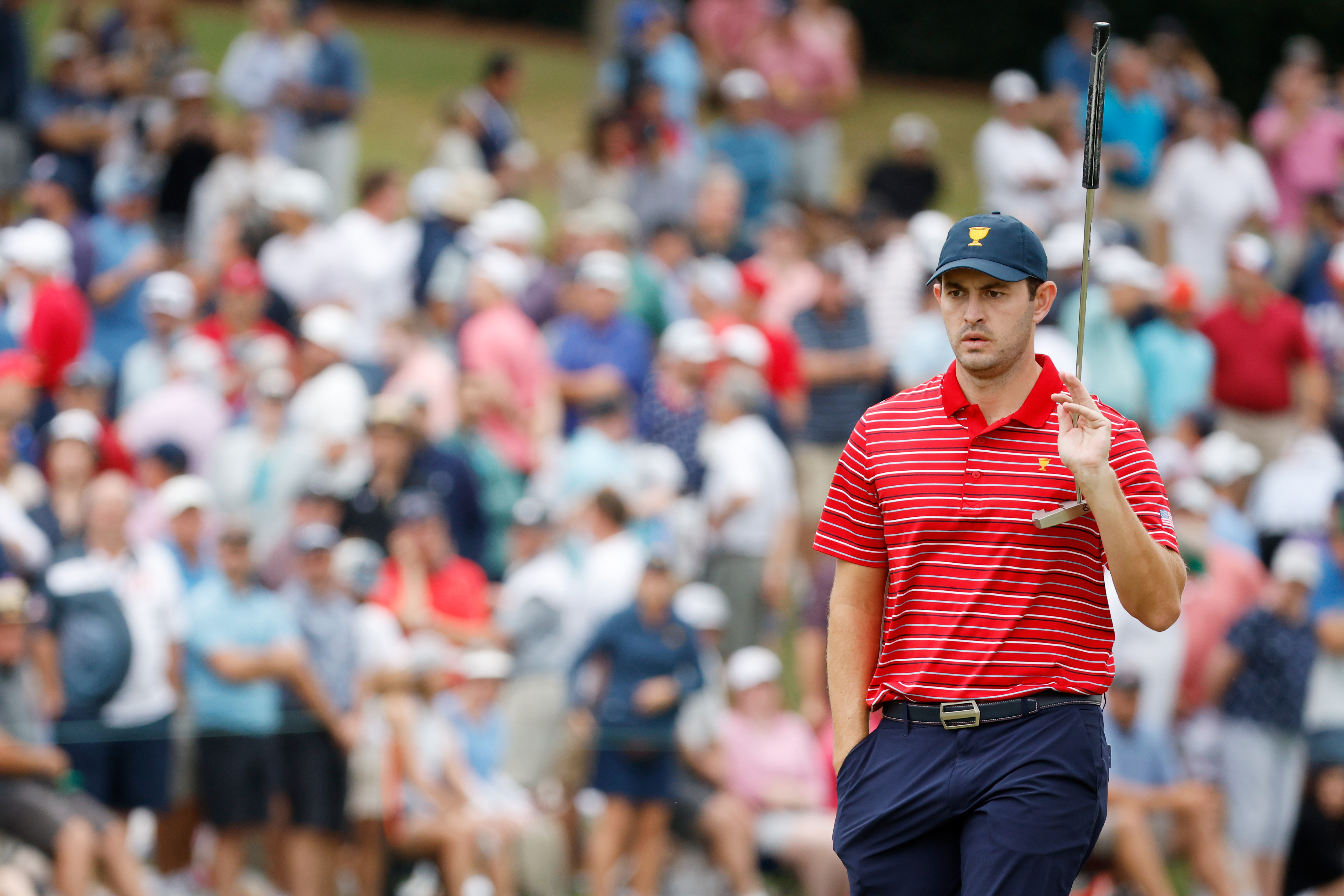Patrick Cantlay of the United States Team reacts on the 15th green during Sunday singles matches on day four of the 2022 Presidents Cup at Quail Hollow Country Club on September 25, 2022 in Charlotte, North Carolina.