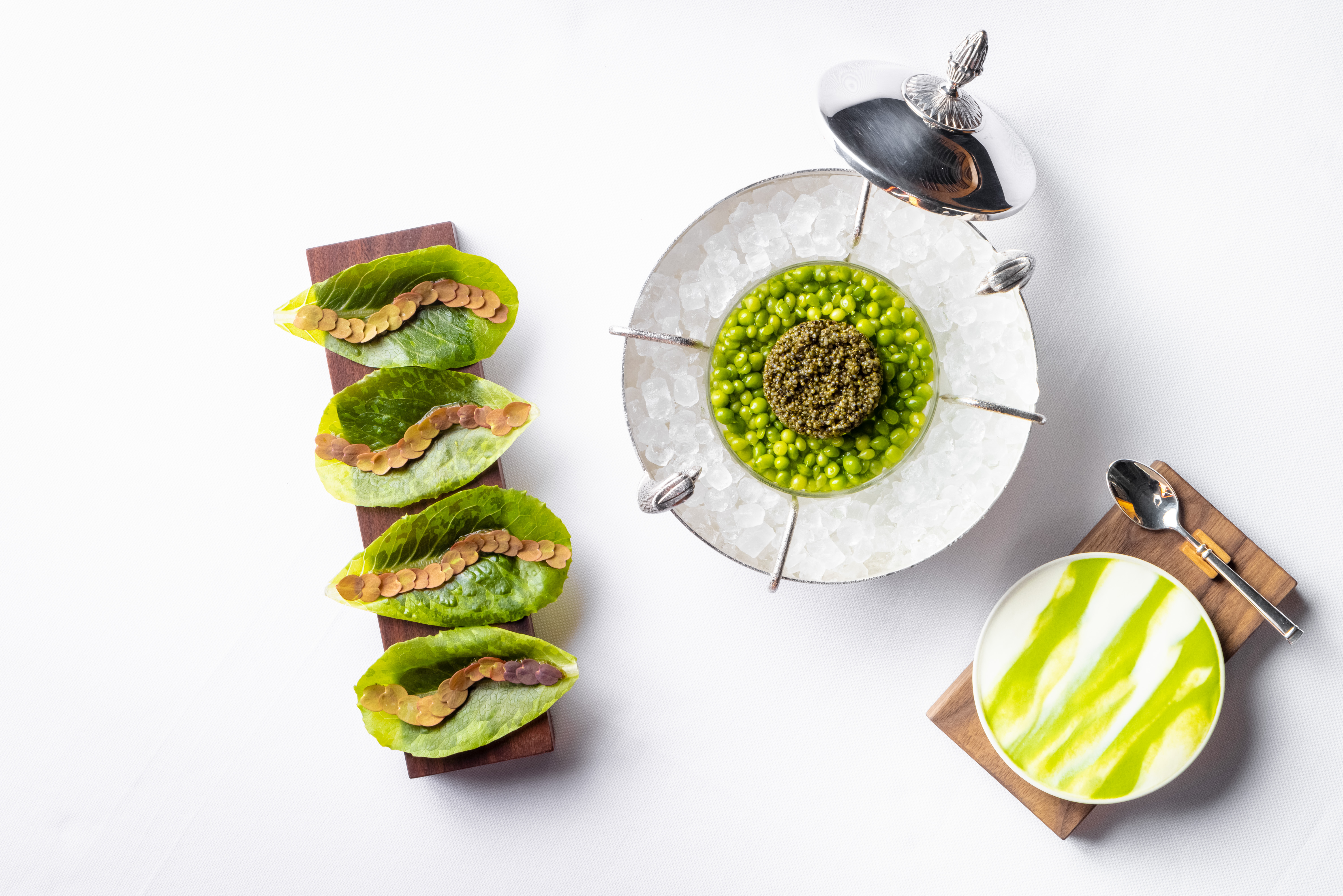 Tonburi caviar sits next to lettuce wraps and vegan creme fraiche