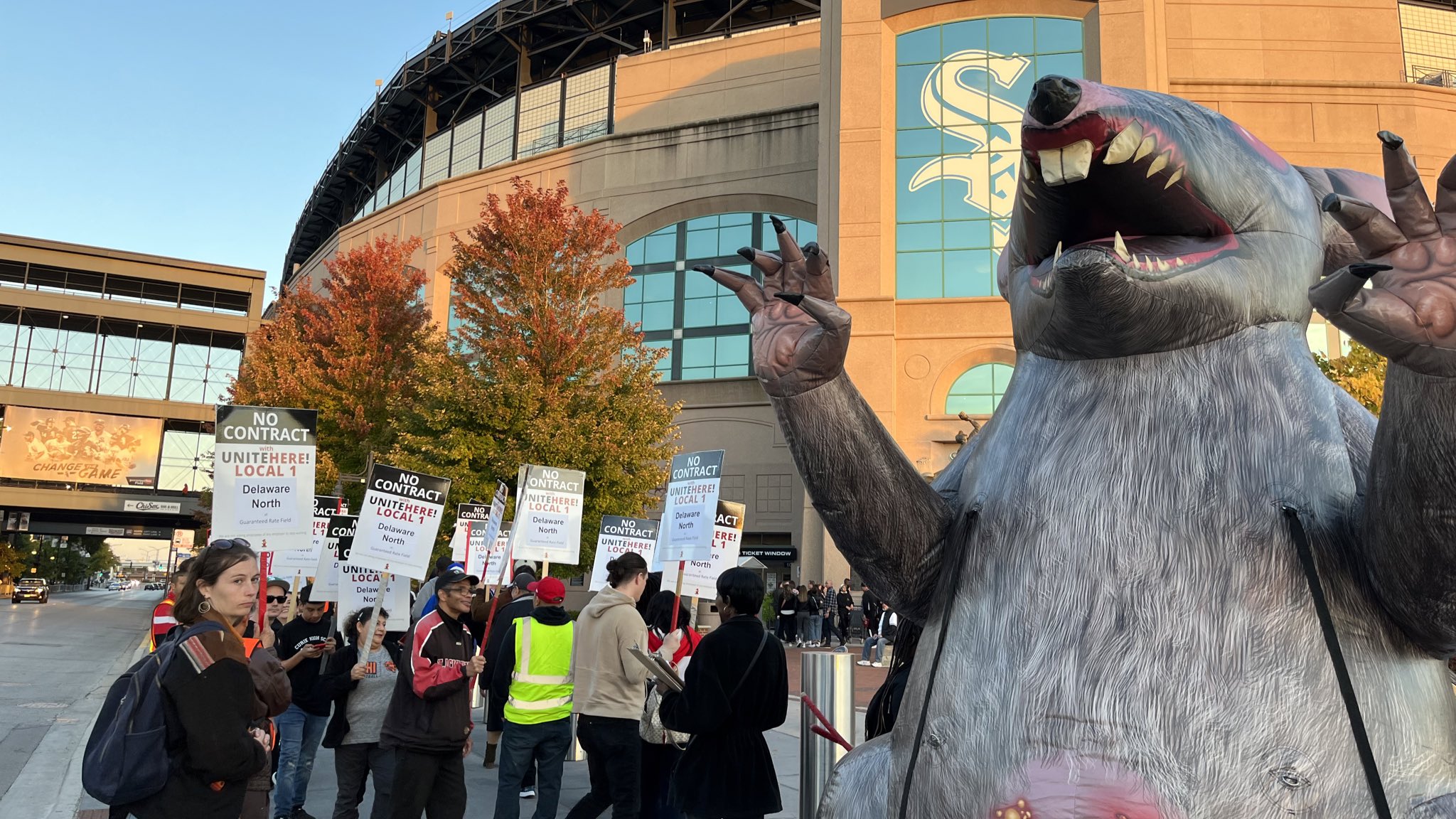 Guaranteed Rate Field concessions workers form a picket line outside the stadium during Tuesday’s game