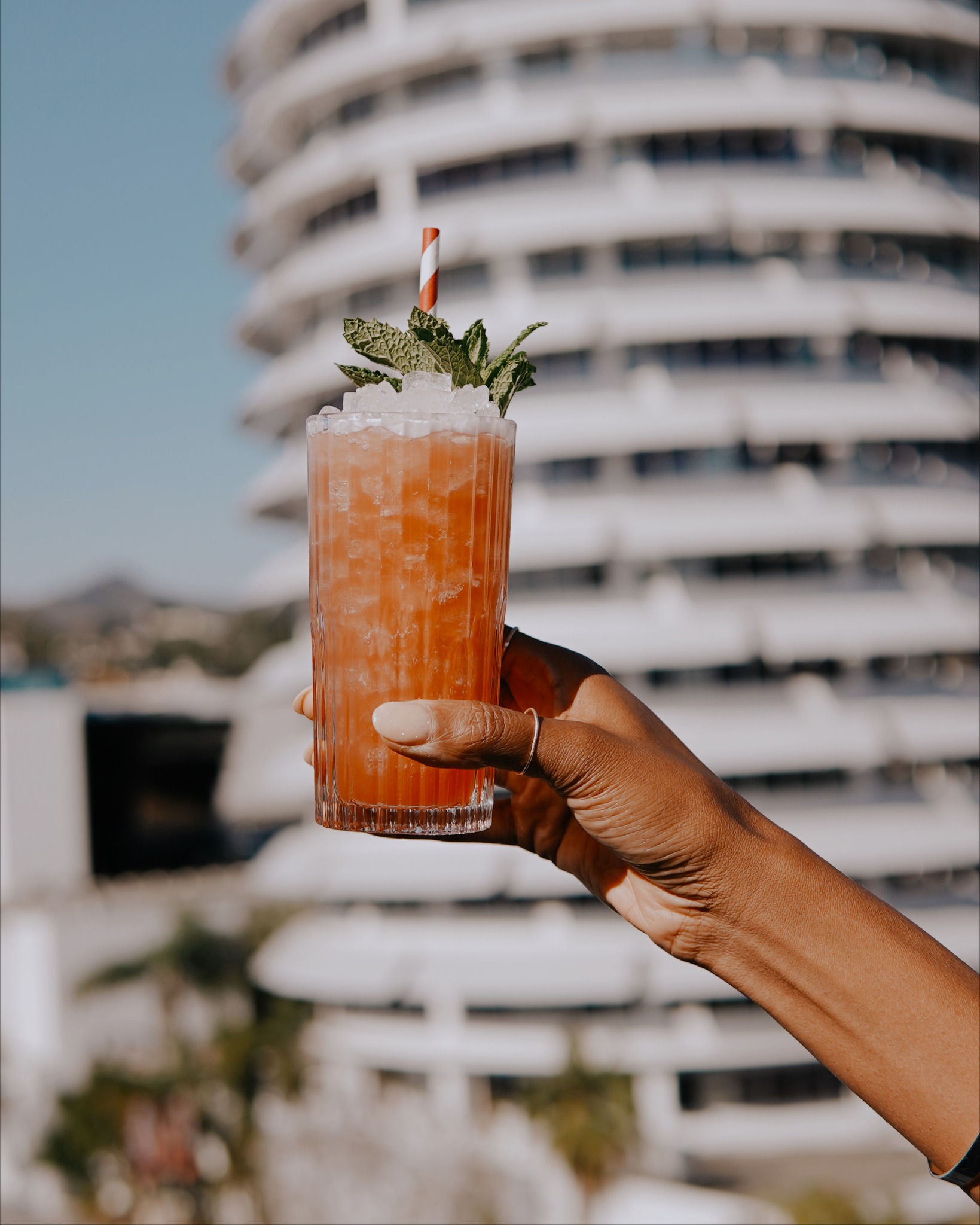 A cocktail at the Lemon Grove rooftop restaurant overlooking the Capitol Records Building.
