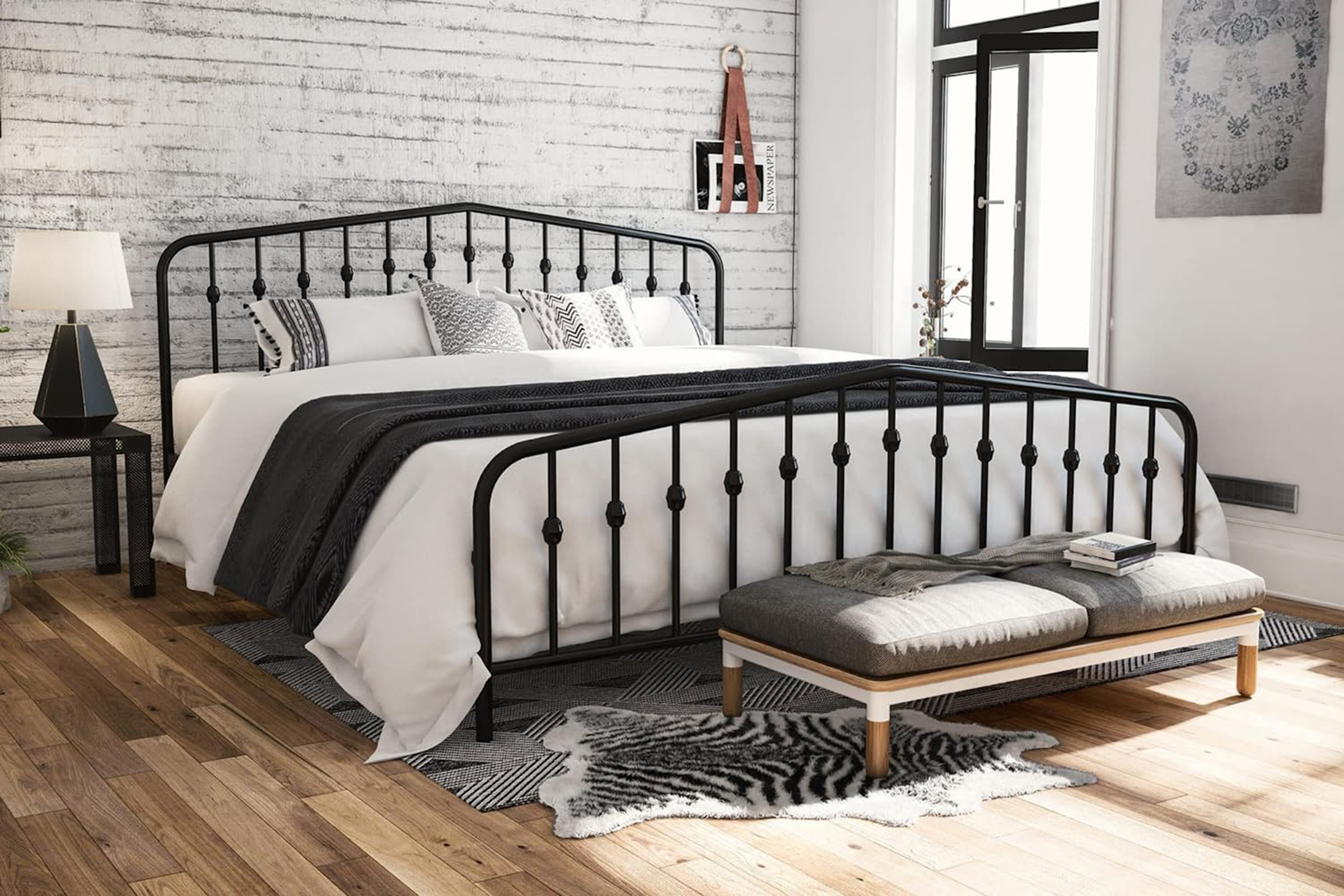 Bedroom with a metal bed frame by Novogratz 