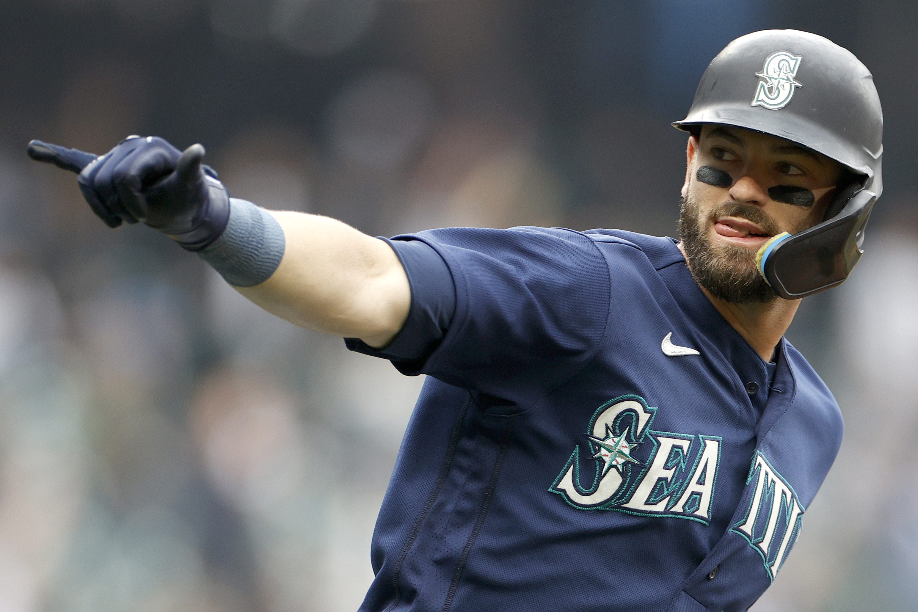 Mitch Haniger #17 of the Seattle Mariners celebrates his home run against the Detroit Tigers during the first inning at T-Mobile Park on October 05, 2022 in Seattle, Washington.