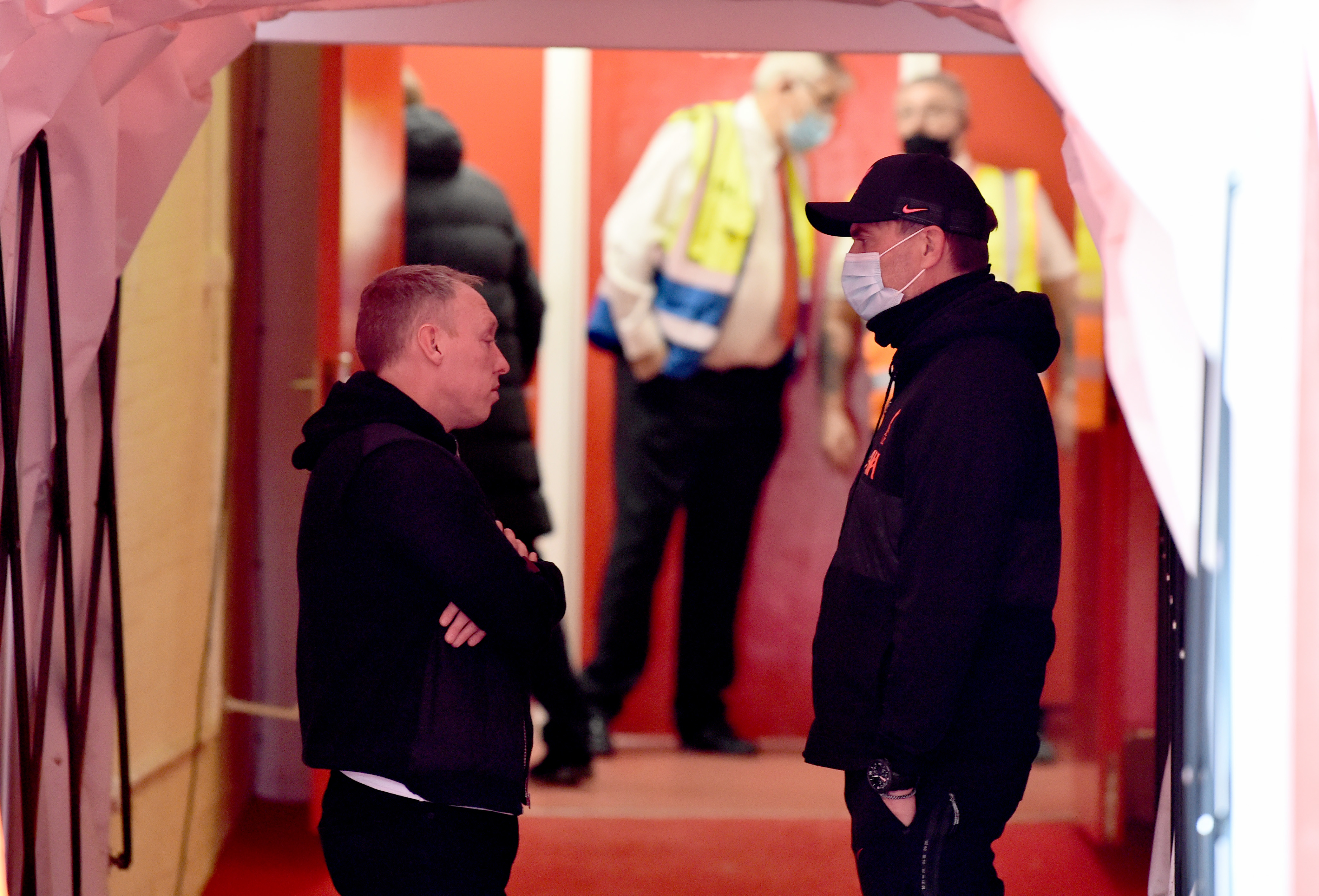 Jurgen Klopp manager of Liverpool with Steve Cooper Manager of Nottingham Forest before the Emirates FA Cup Quarter Final match between Nottingham Forest and Liverpool at City Ground on March 20, 2022 in Nottingham, England.