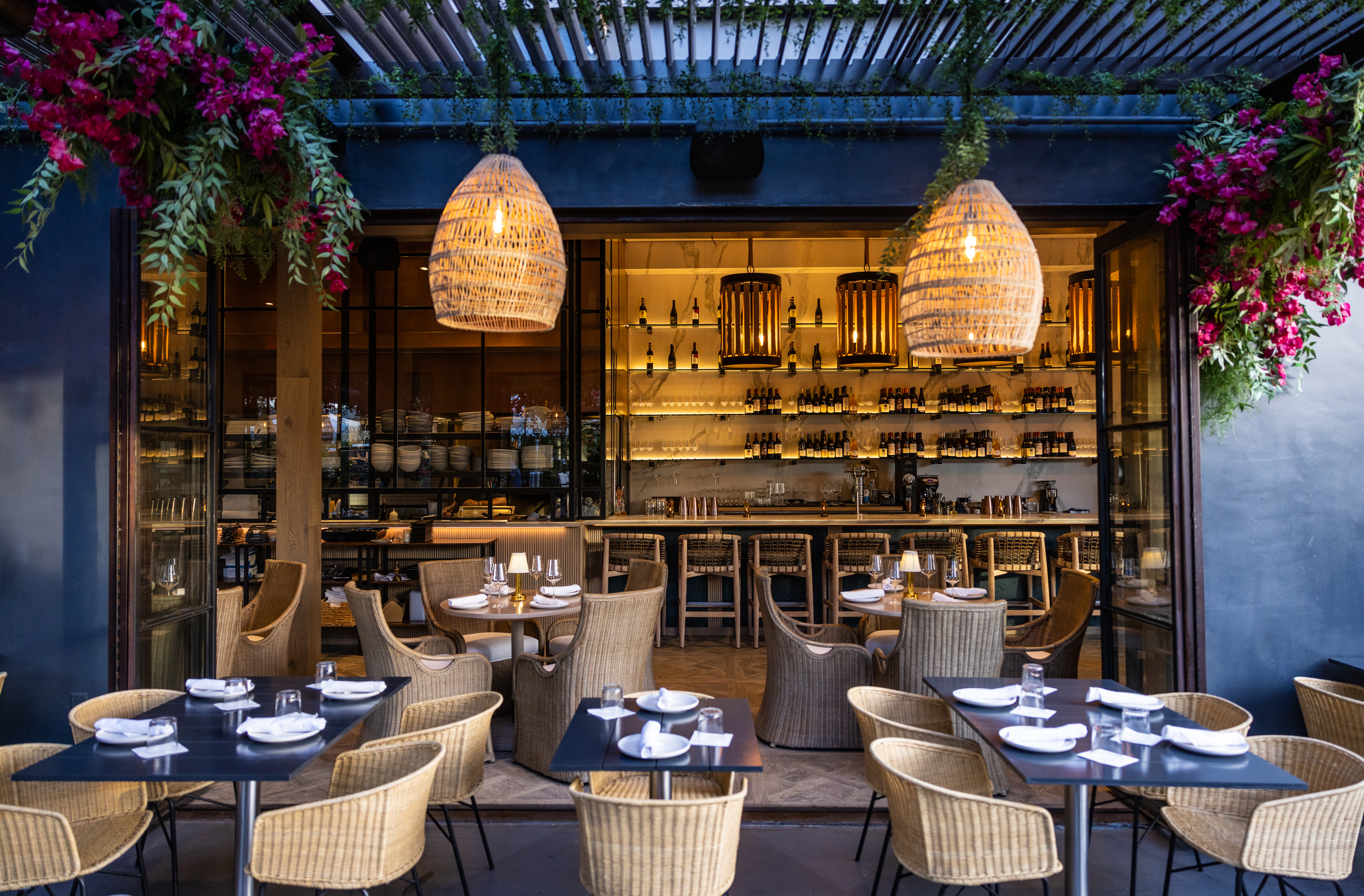 An outdoor and indoor dining area at Paloma restaurant in Venice, California.