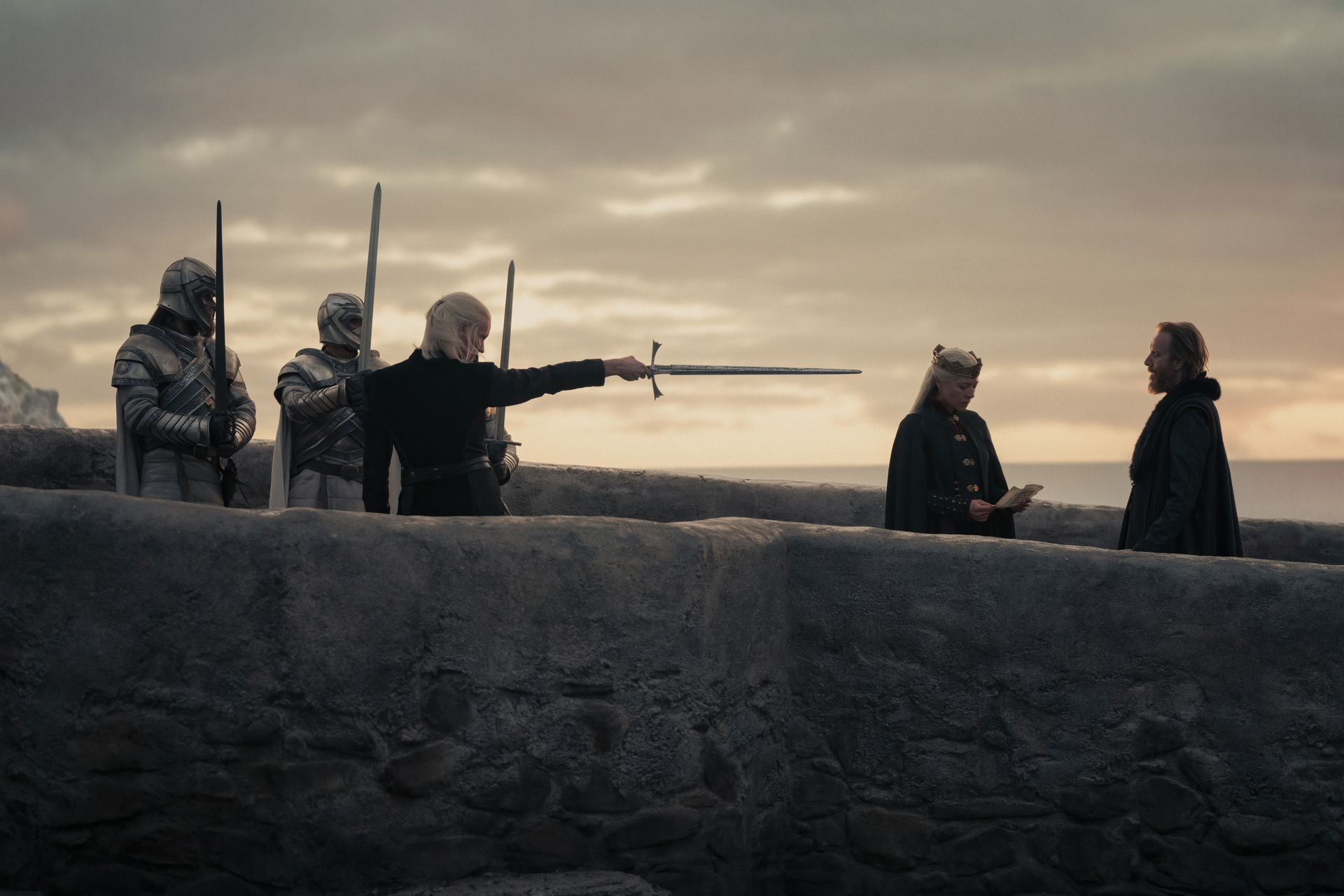 Matt Smith as Daemon Targaryen, facing off against Rhys Ifans as Otto Hightower and Emma D’Arcy as Rhaenyra Targaryen in HBO’s House of the Dragon