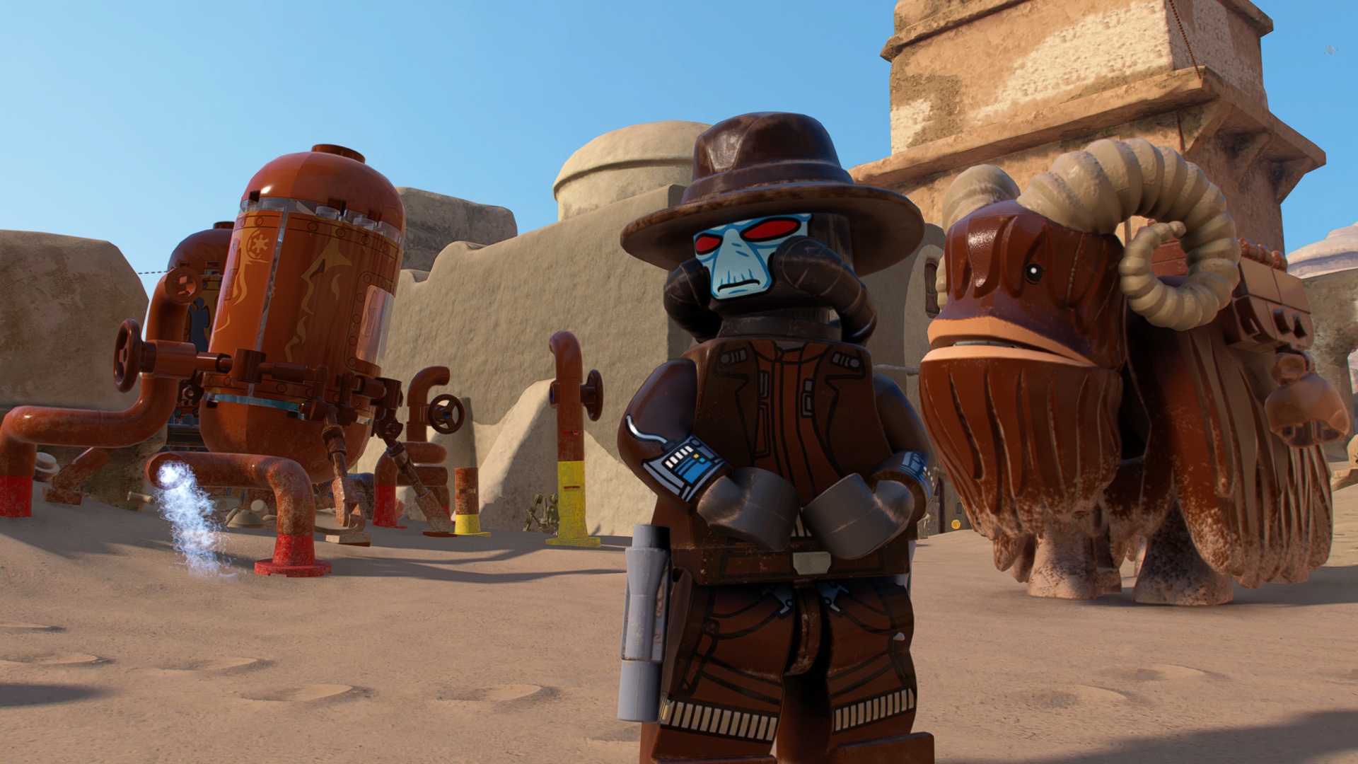 A Lego minifigure version of Cad Bane stands on the streets of a Tatooine city with a Lego Bantha and a building behind him in a screenshot from Lego Star Wars: The Skywalker Saga.