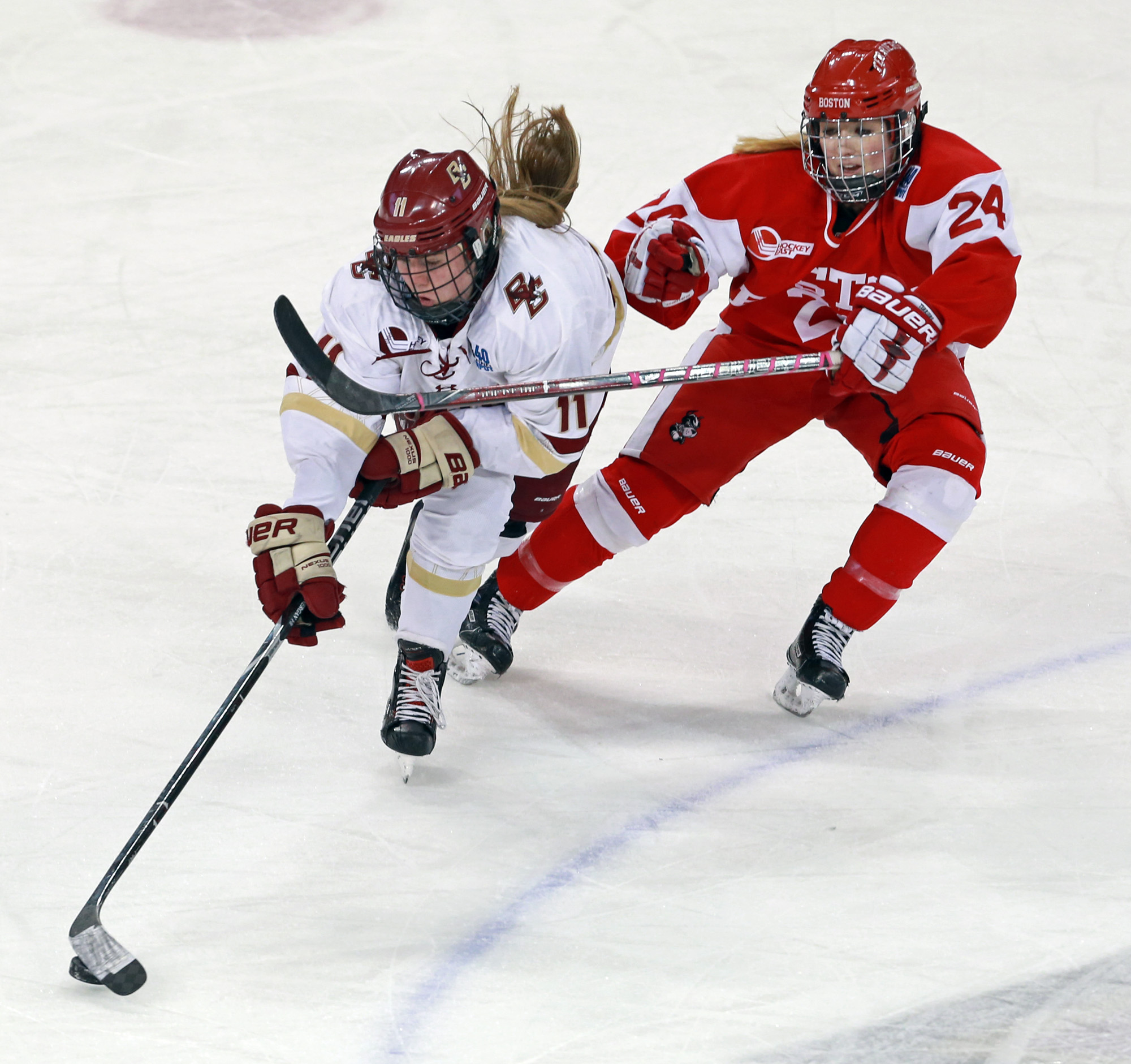 (2/13/18,Boston) Boston College Eagles forward Erin Connolly (15) (L) puts pressure on Boston University Terriers defenseman Abby Cook (9) as BU takes on BC in the Woman’s Beanpot Final at Conte Forum. Tuesday, February 13, 2018. (Staff pho