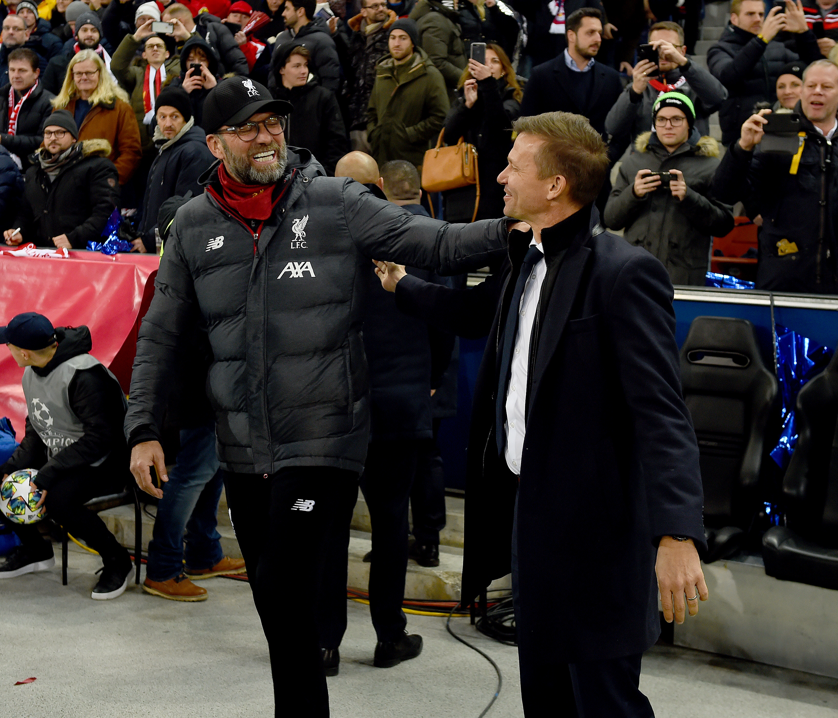 Jürgen Klopp Manager of Liverpool with Jesse Marsch Manager of RB Salzburg during the UEFA Champions Le ague group E match between RB Salzburg and Liverpool FC at Red Bull Arena on December 10, 2019 in Salzburg, Austria.