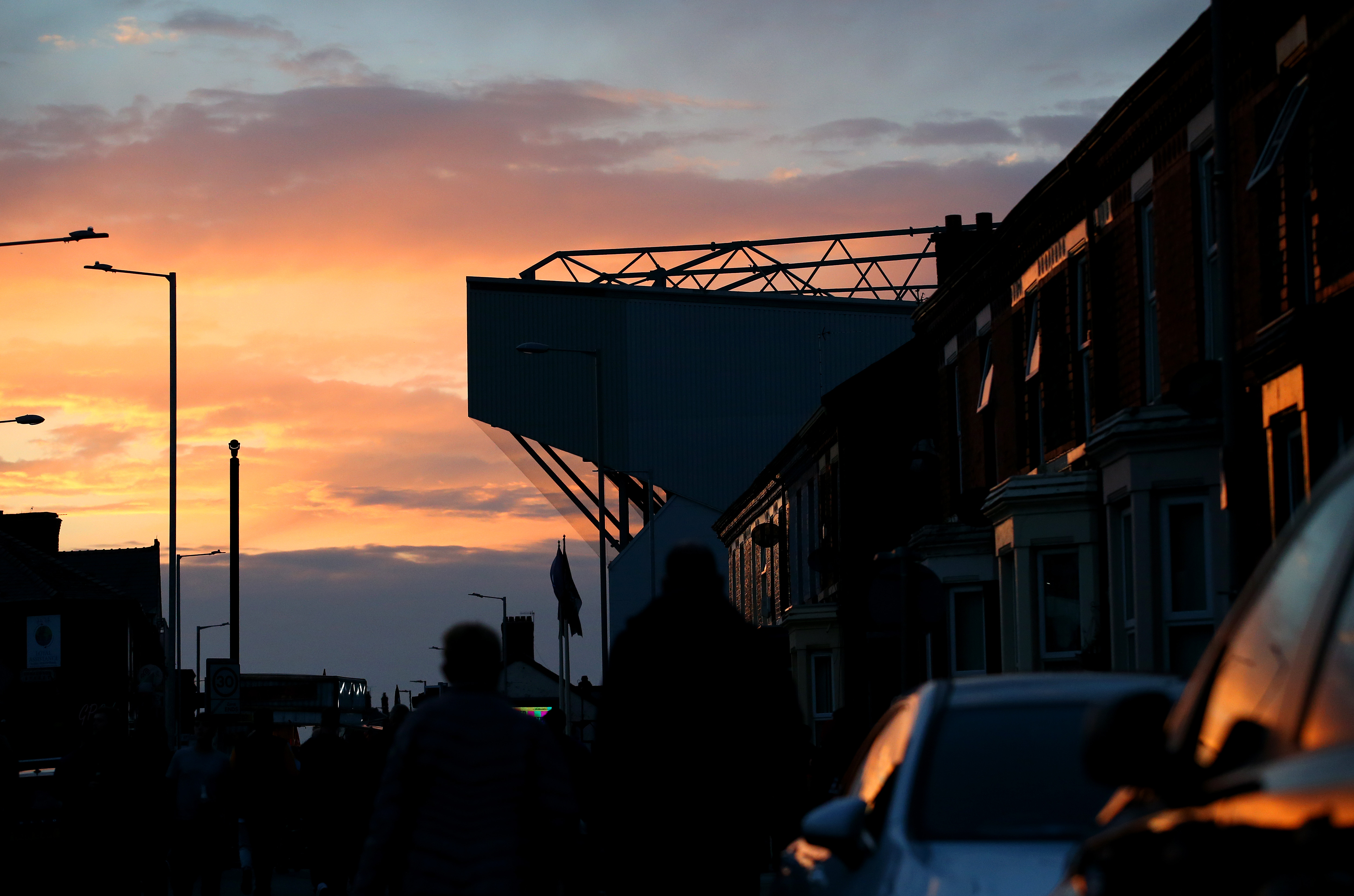 Anfield is seen through the streets as the sun sets prior to the UEFA Champions League group B match between Liverpool FC and AC Milan at Anfield on September 15, 2021 in Liverpool, England.