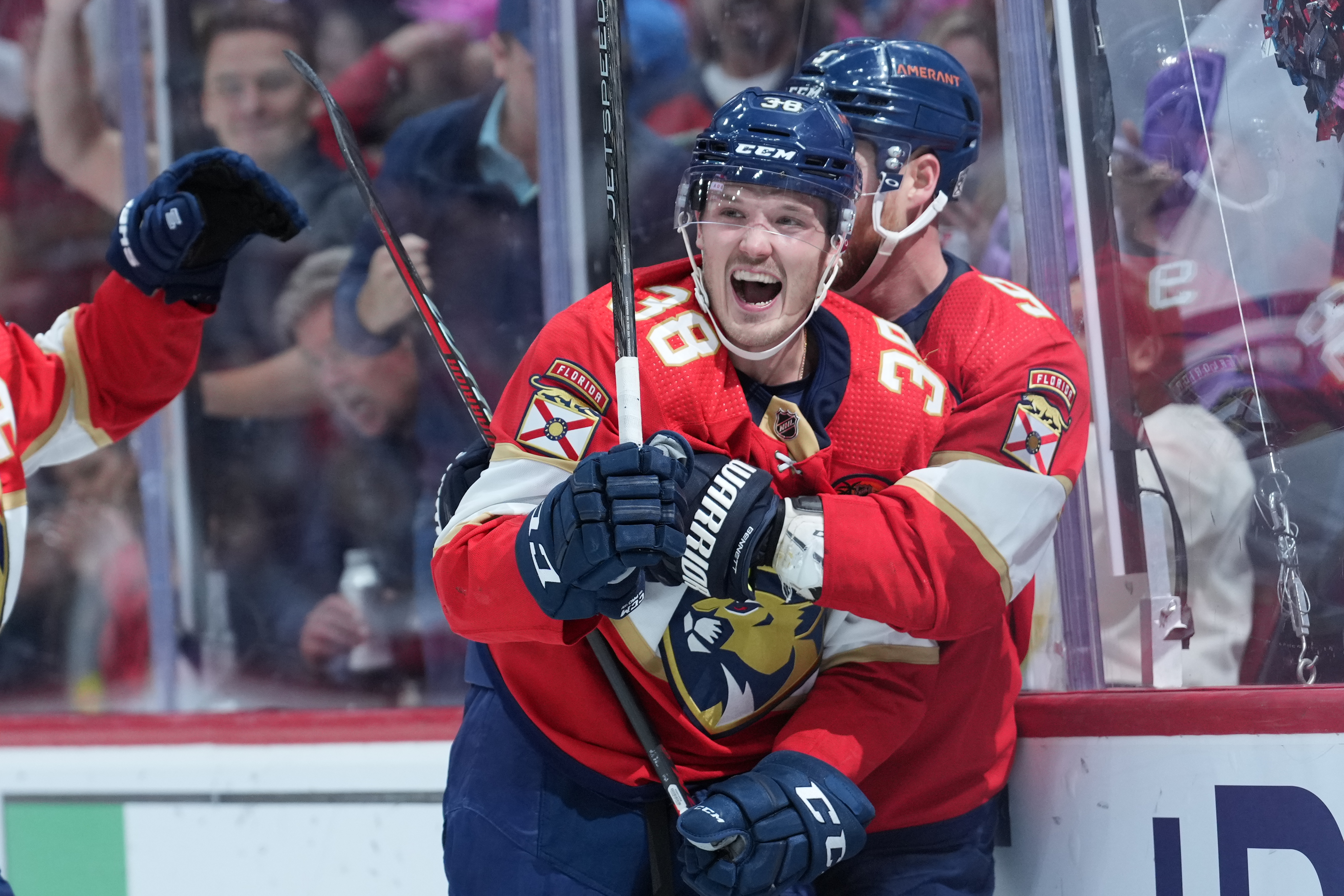 Florida Panthers left wing Rudolfs Balcers (38) celebrates his goal with Florida Panthers center Sam Bennett (9) during the game between the Tampa Bay Lightning and the Florida Panthers on Friday, October 21, 2022 at FLA Live Arena in Sunrise, FL.