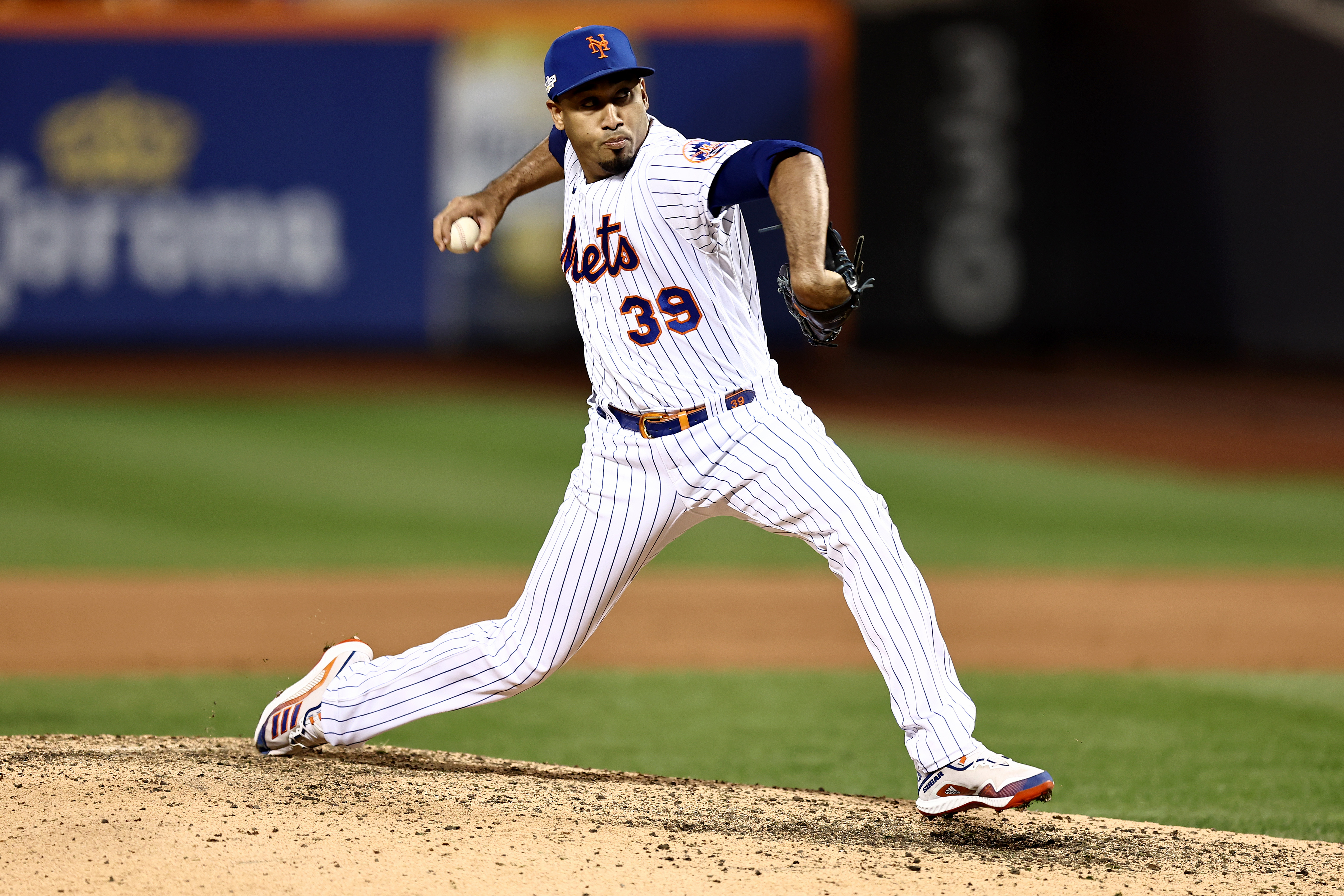 Edwin Diaz #39 of the New York Mets throws a pitch against the San Diego Padres during the eighth inning in game three of the National League Wild Card Series at Citi Field on October 09, 2022 in the Flushing neighborhood of the Queens borough of New York City.