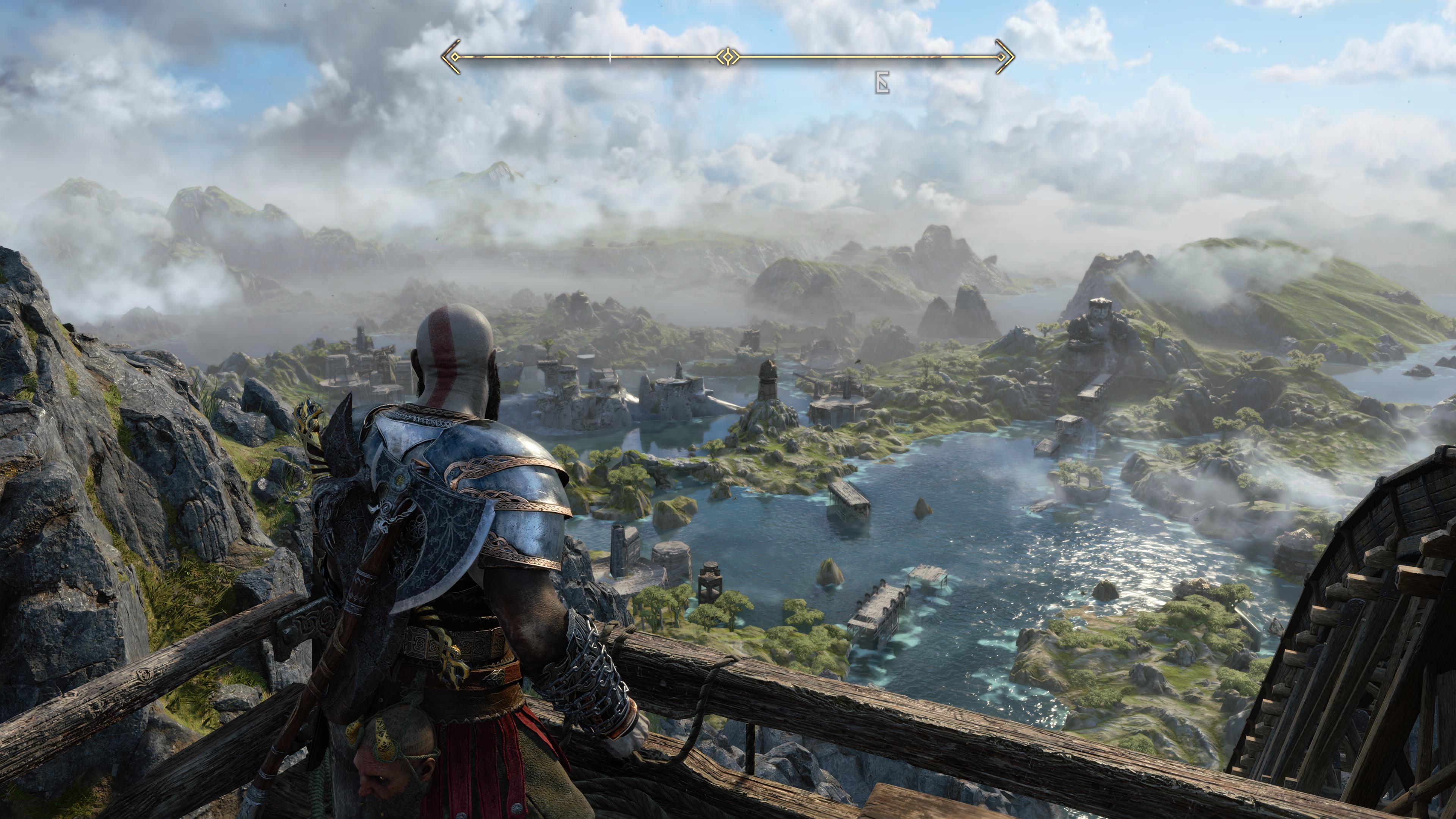 Kratos stands on a vista and looks out at the Bay of Bounty in God of War Ragnarok